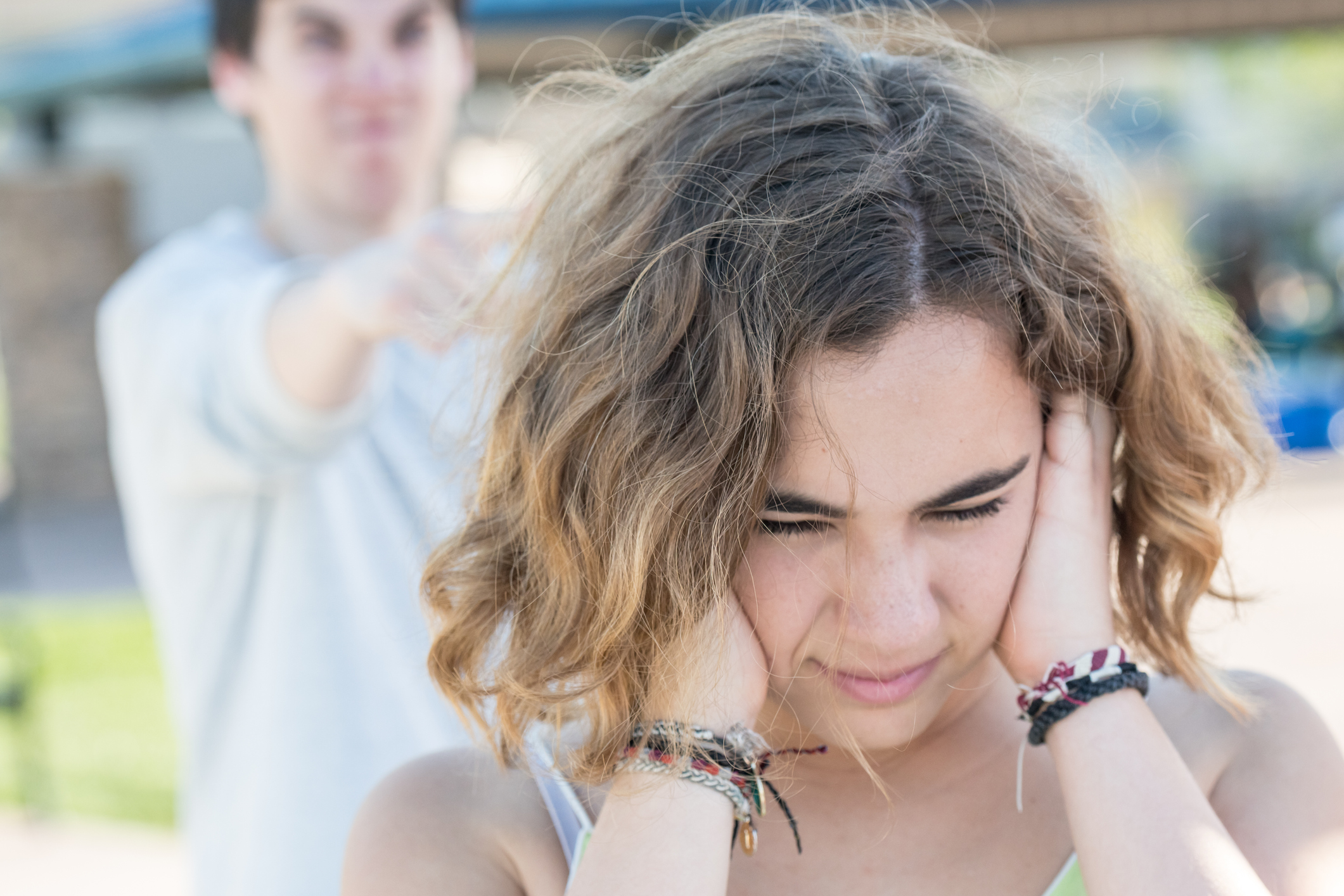 teenage couple arguing