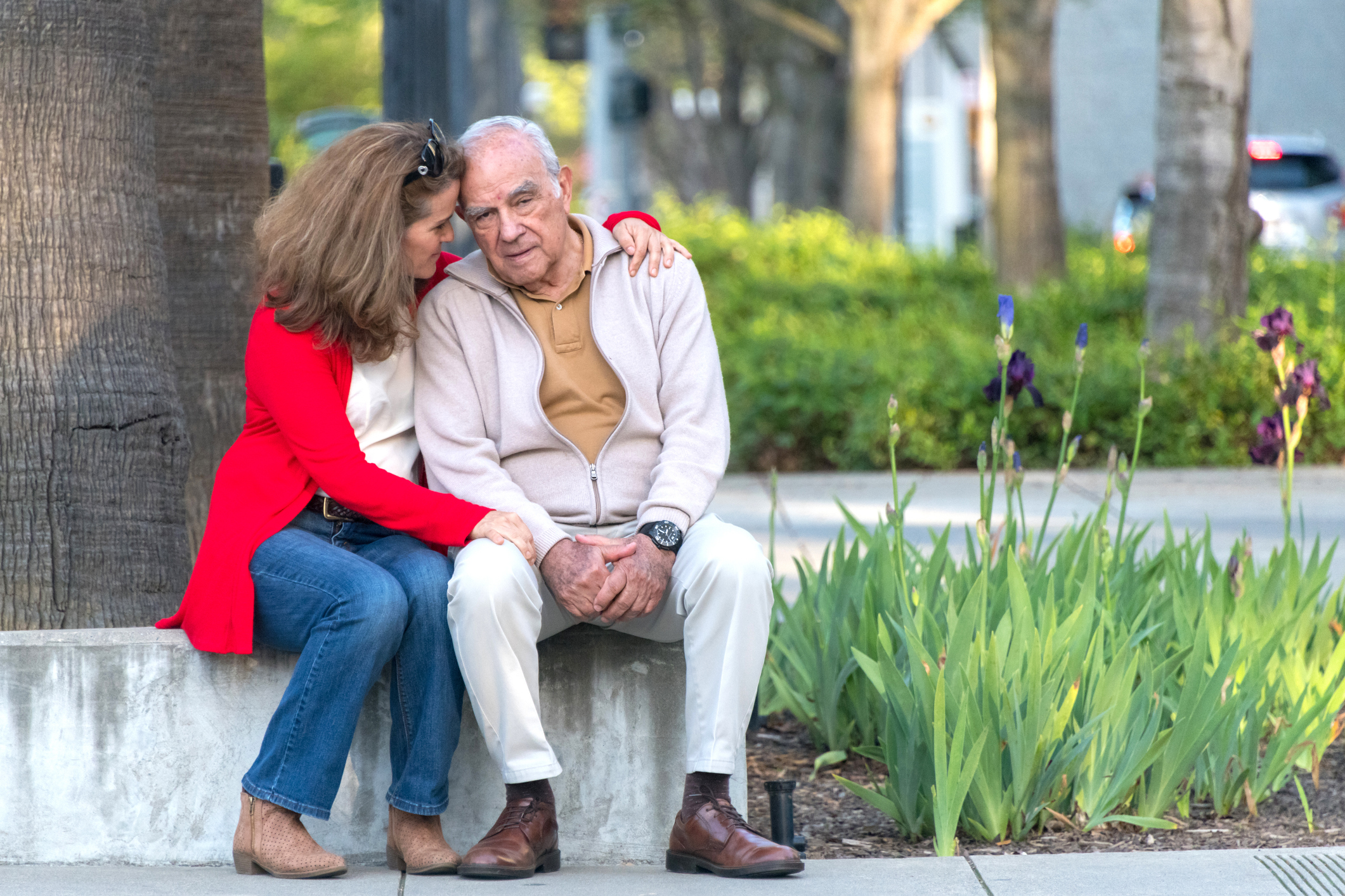 senior man possing with his daughter