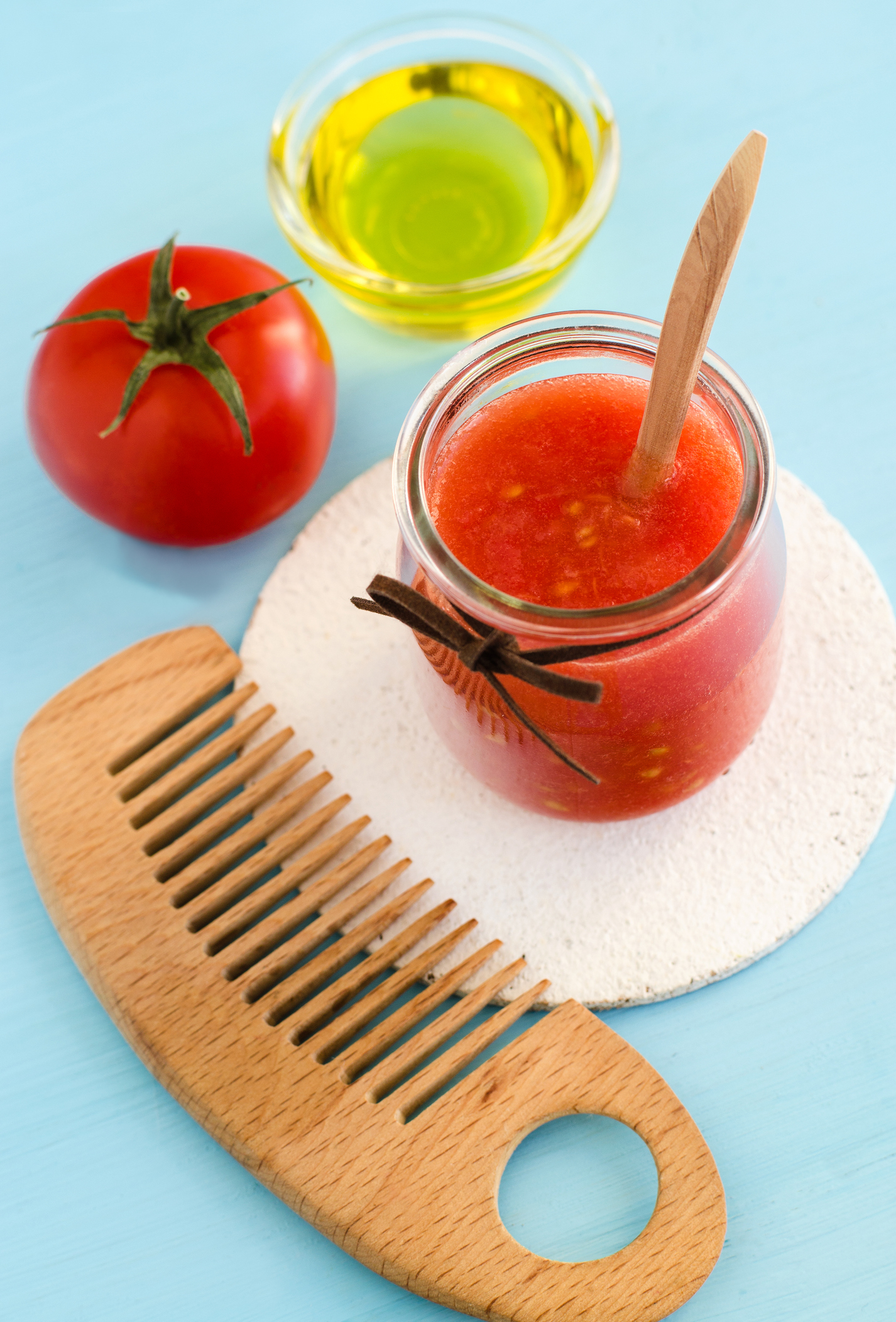 Homemade tomato hair mask in a glass jar. Diy cosmetics.