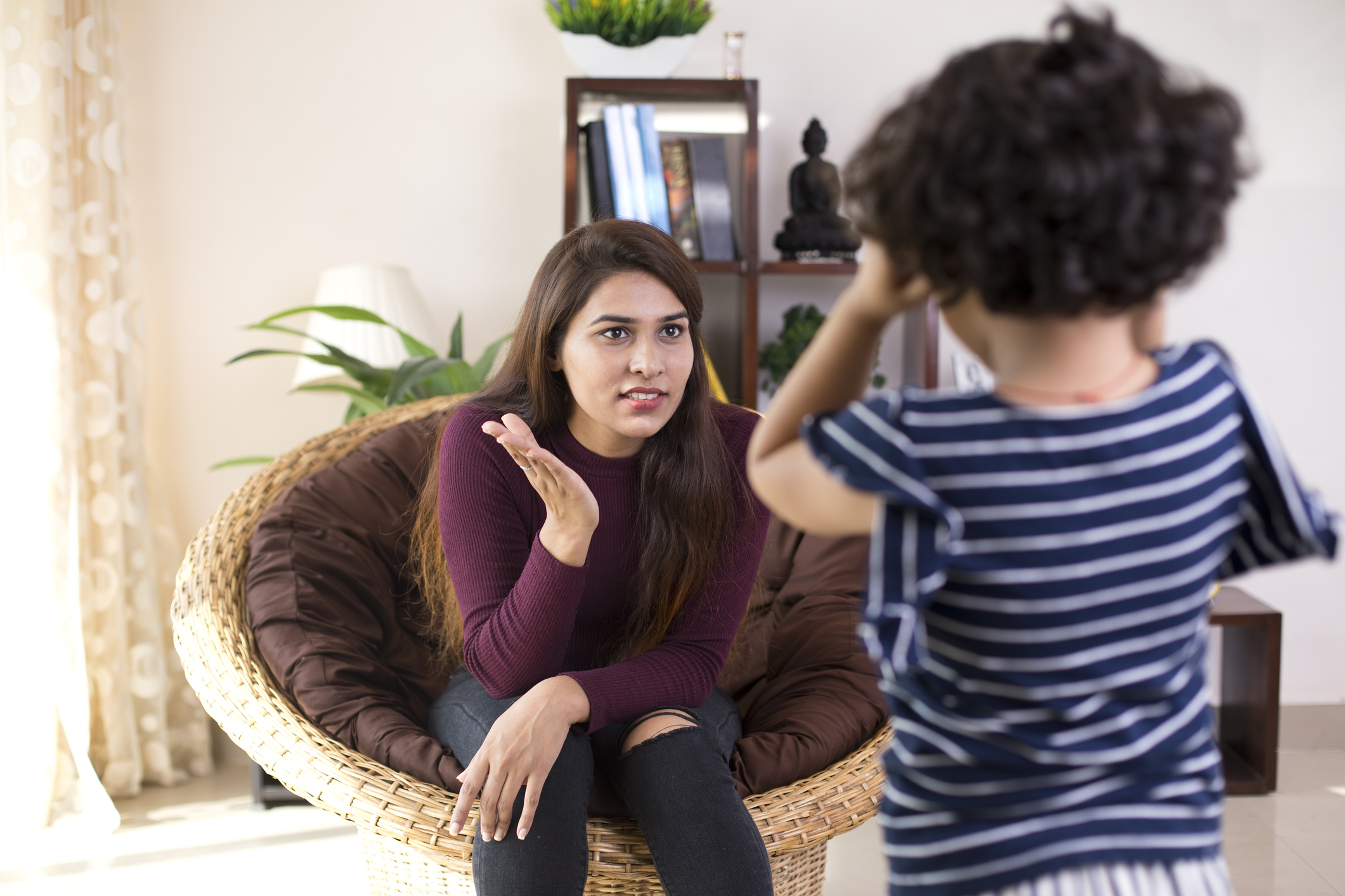 Mother scolding her daughter