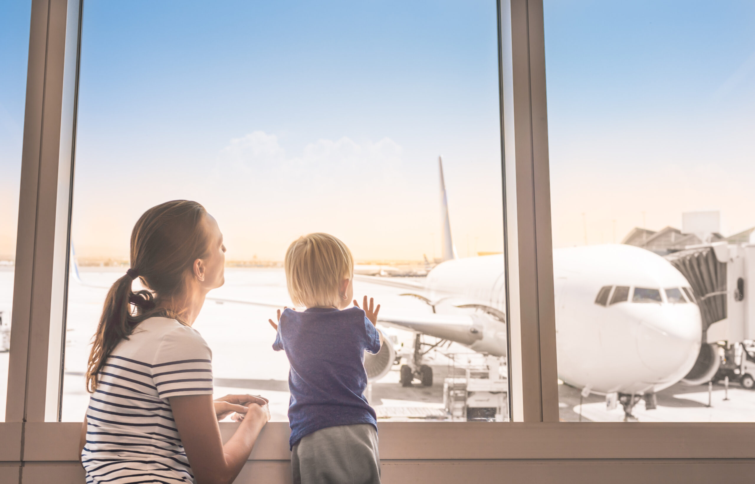 Mother and son in the airport