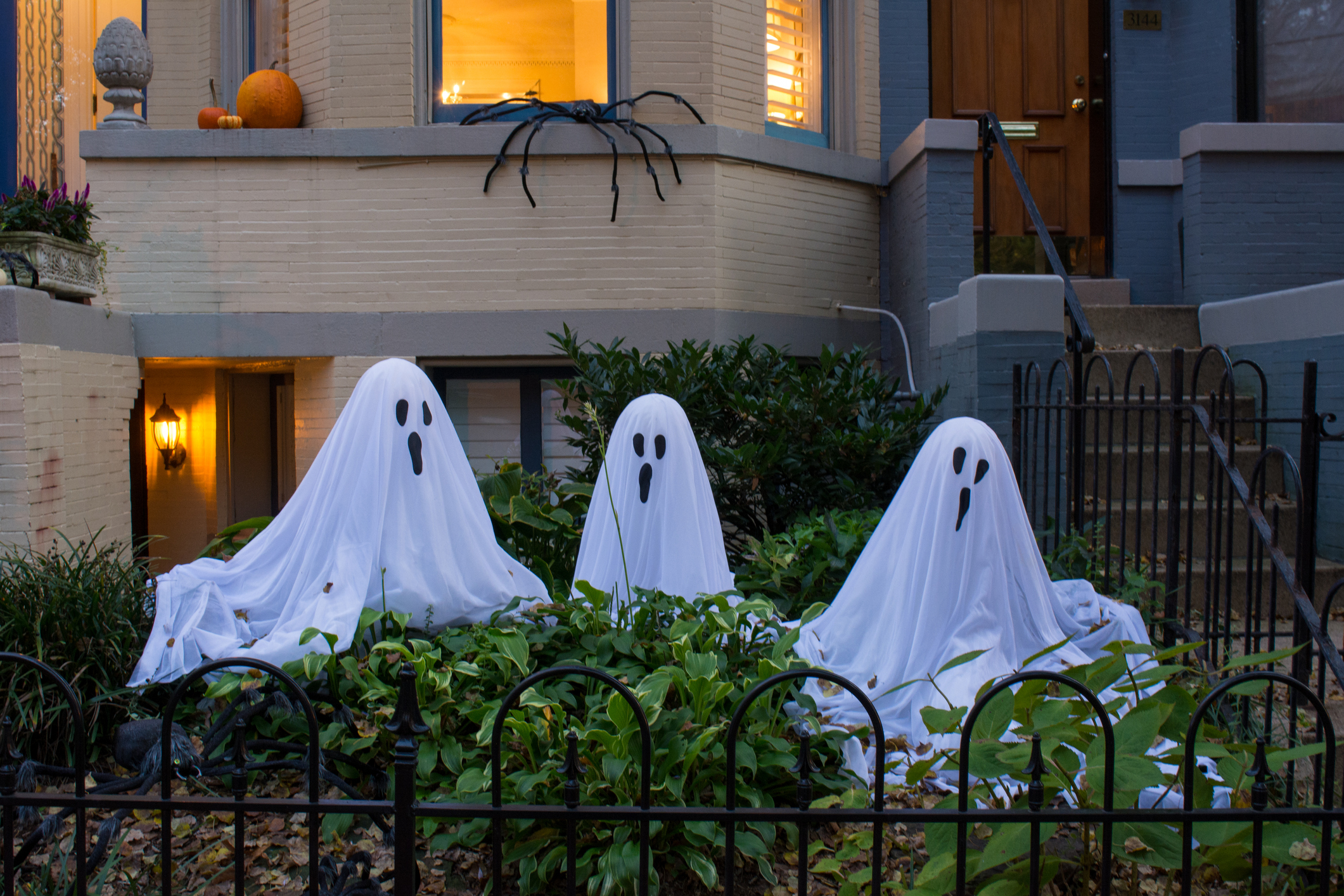 Halloween Decoration Made with Three Ghosts in a Garden for Halloween Celebrations in Georgetown. Washington, Virginia