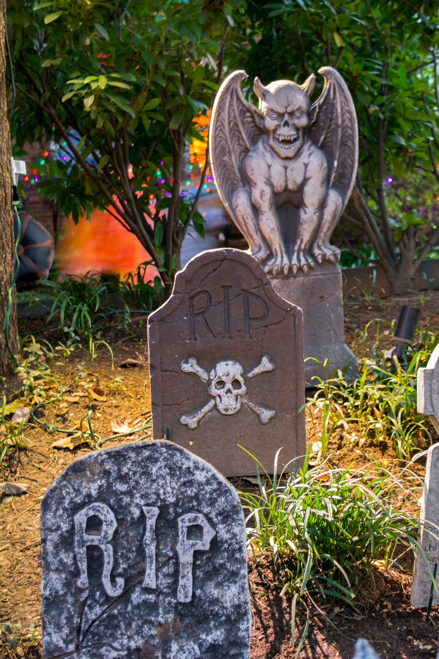 Halloween Decoration Made with Tombstones in a Garden during Halloween Celebration at Night in Georgetown. Wahington, Virginia