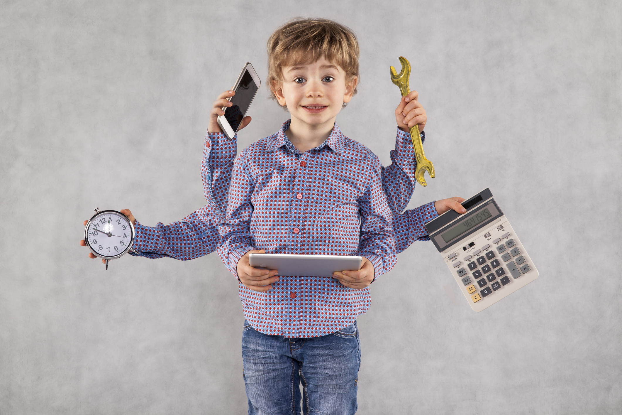 young businessman is very multitasking person, octopus concept, a lot of hands