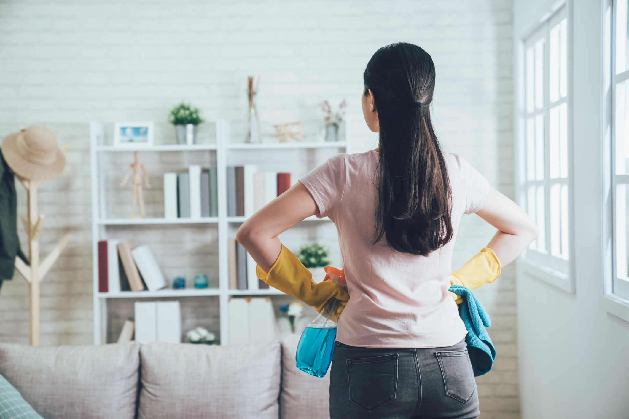 housekeeper looking at the clean living room