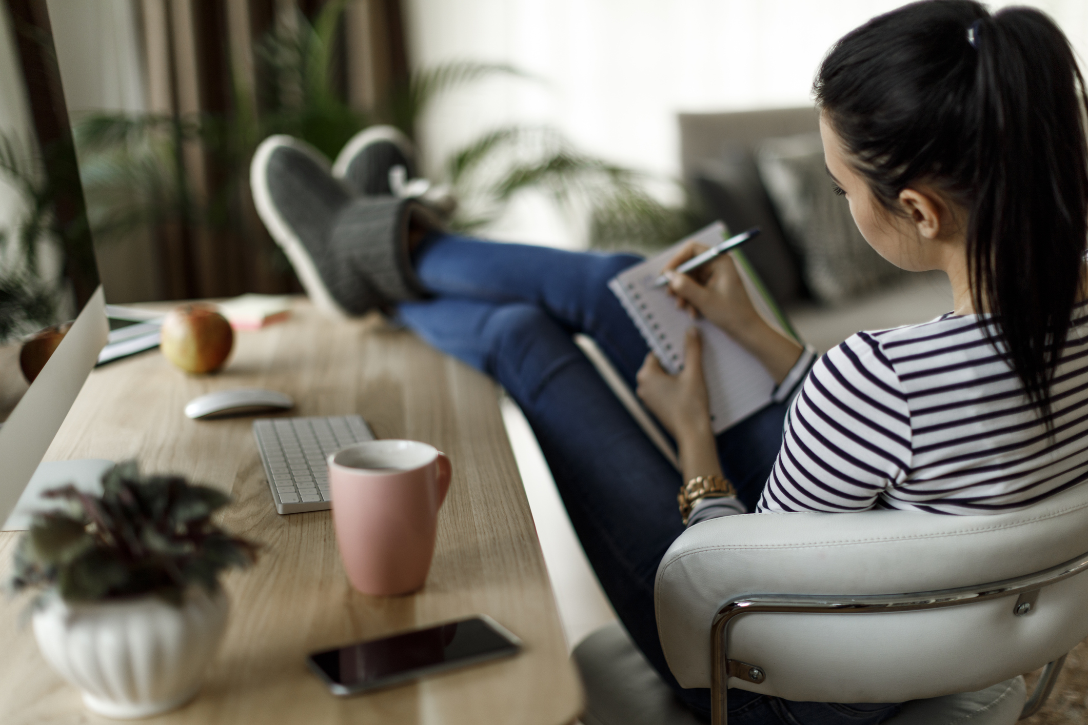 Young woman working at home