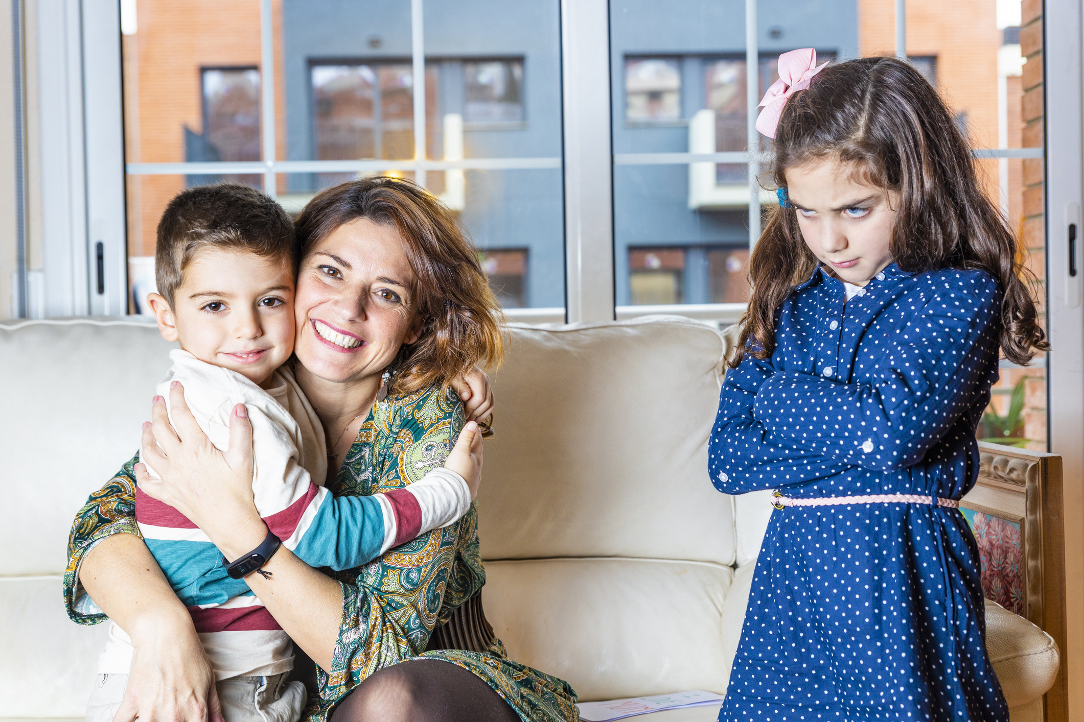 Jealous girl to see her brother hug her mother