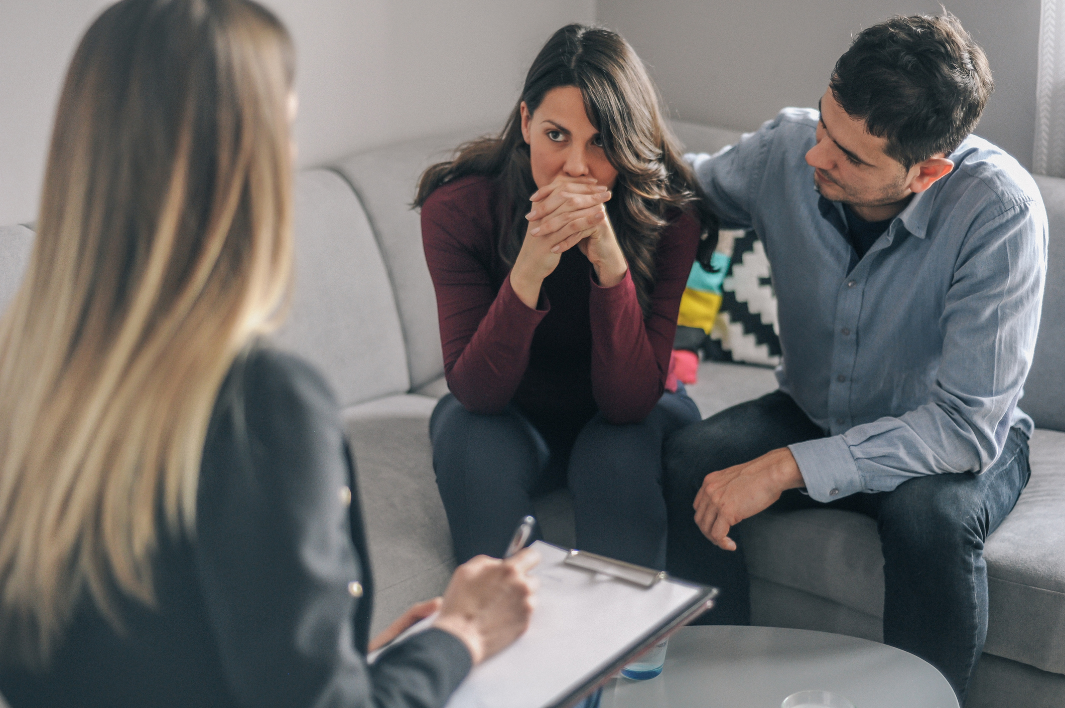 Young couple on counseling appointment during pregnancy