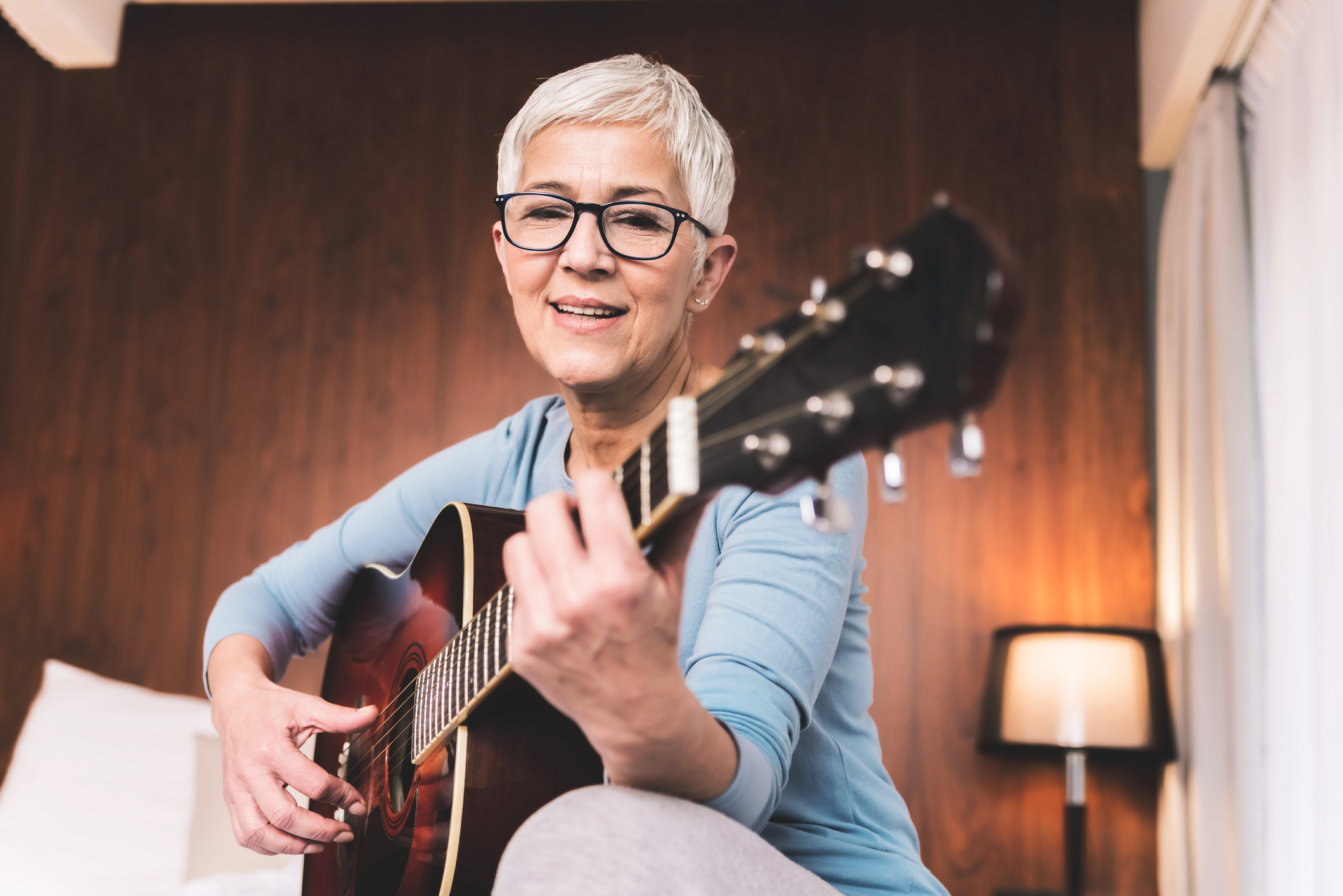 Woman playing guitar