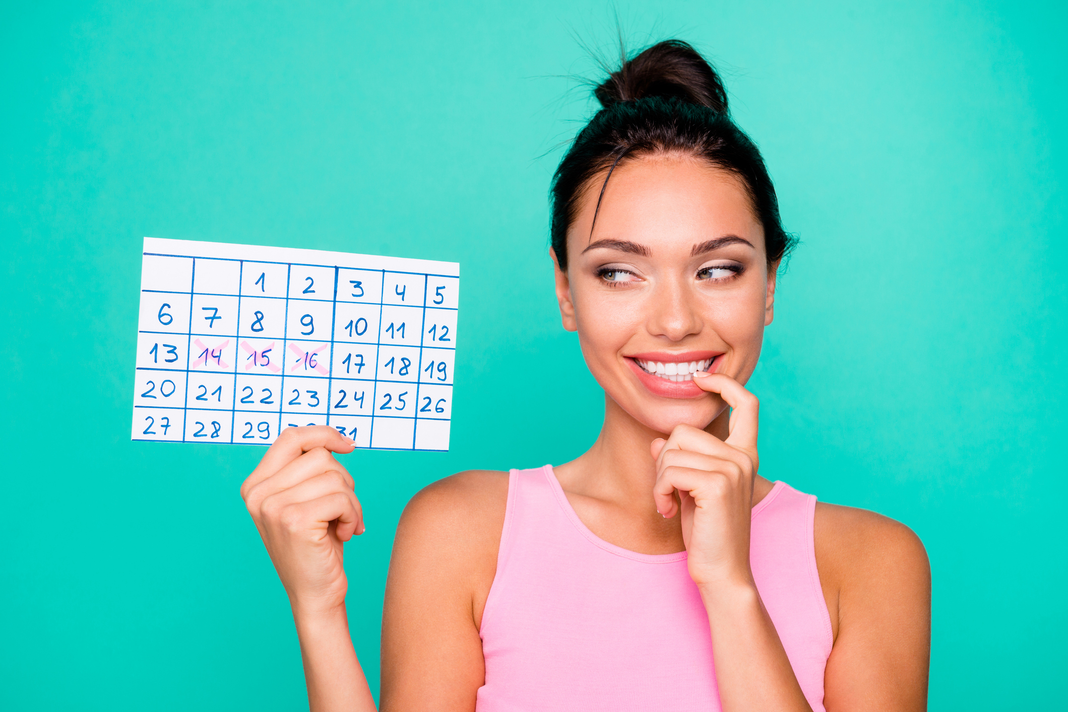 Close up photo beautiful amazing she her lady funny hairstyle bite finger hold hand arm paper calendar birthday party coming tricky mood wear casual pink tank-top isolated teal turquoise background