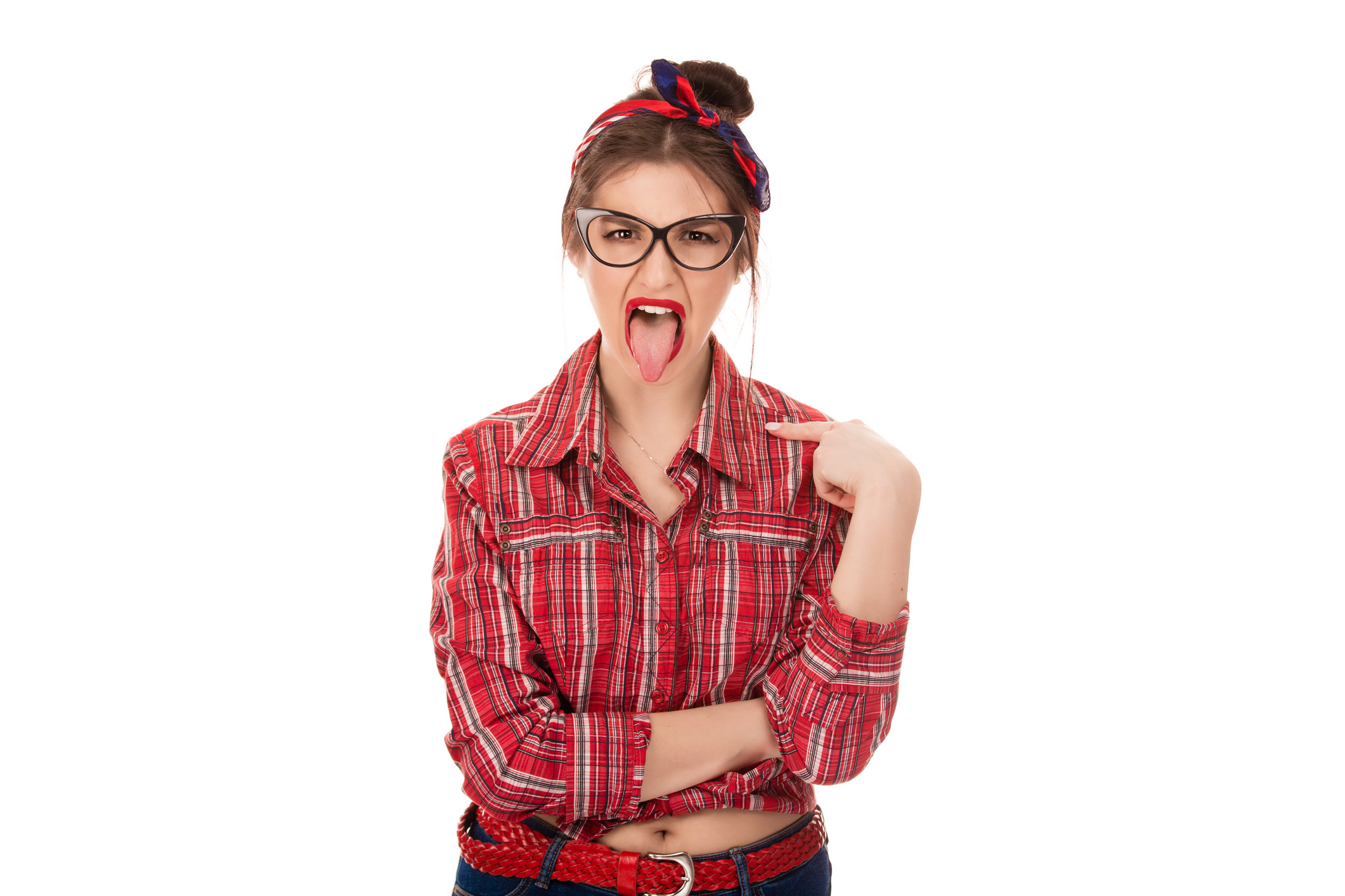 angry, young, childish rude bully woman sticking tongue out at you camera gesture