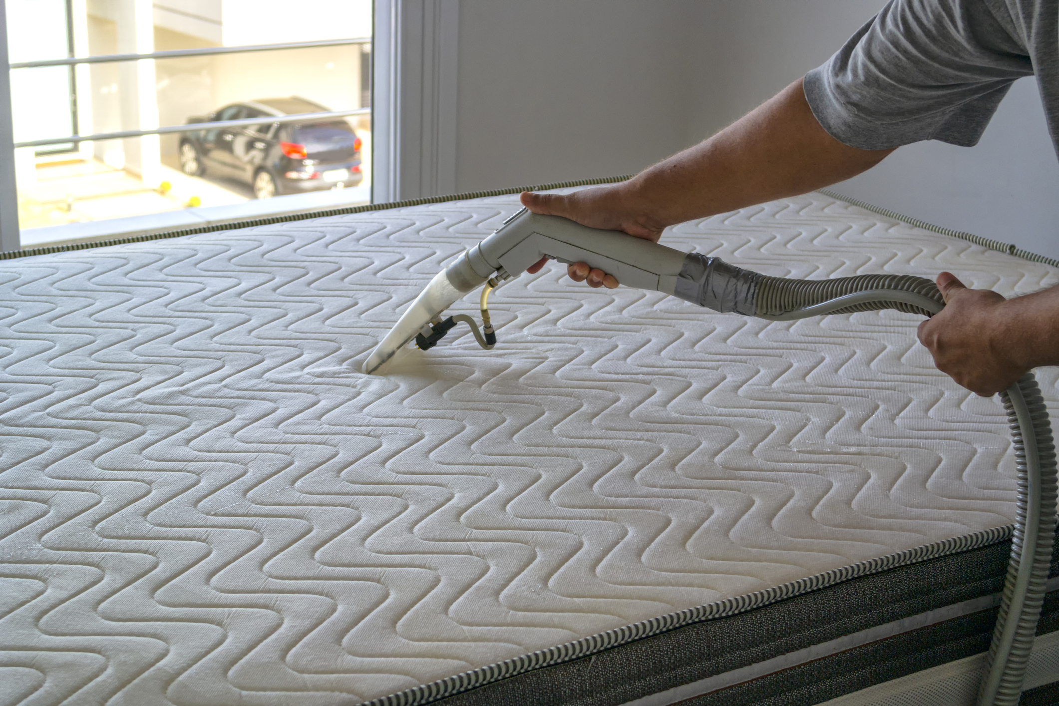 Cleaning the mattress.