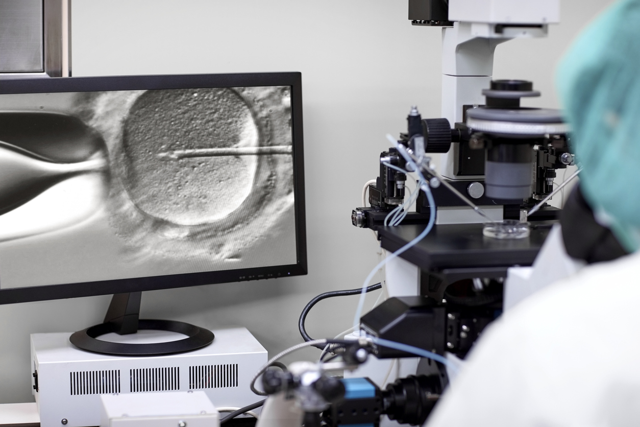 Laboratroy technician fertilizing an egg