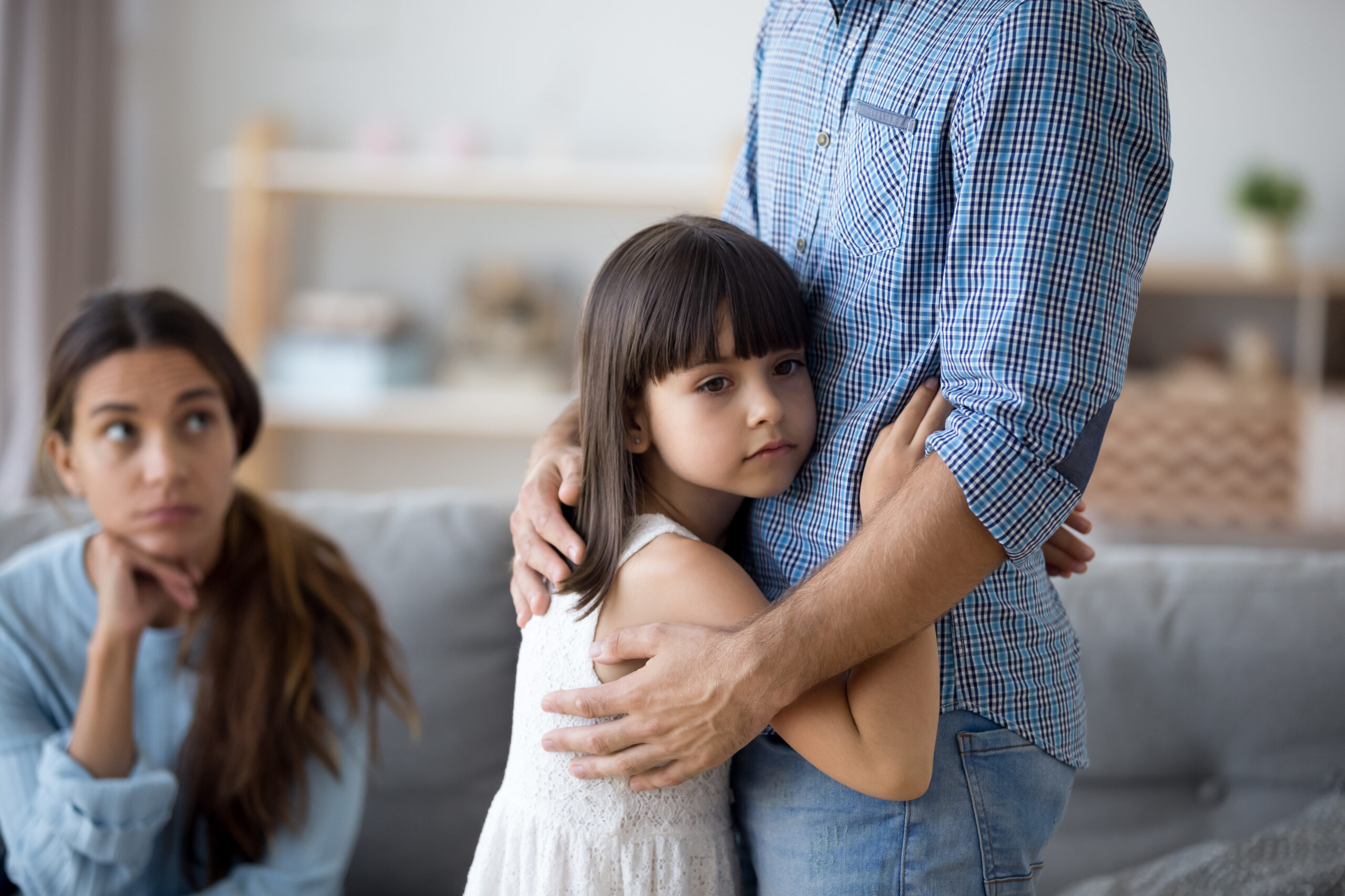 Unhappy little child hug leaving parent say goodbye