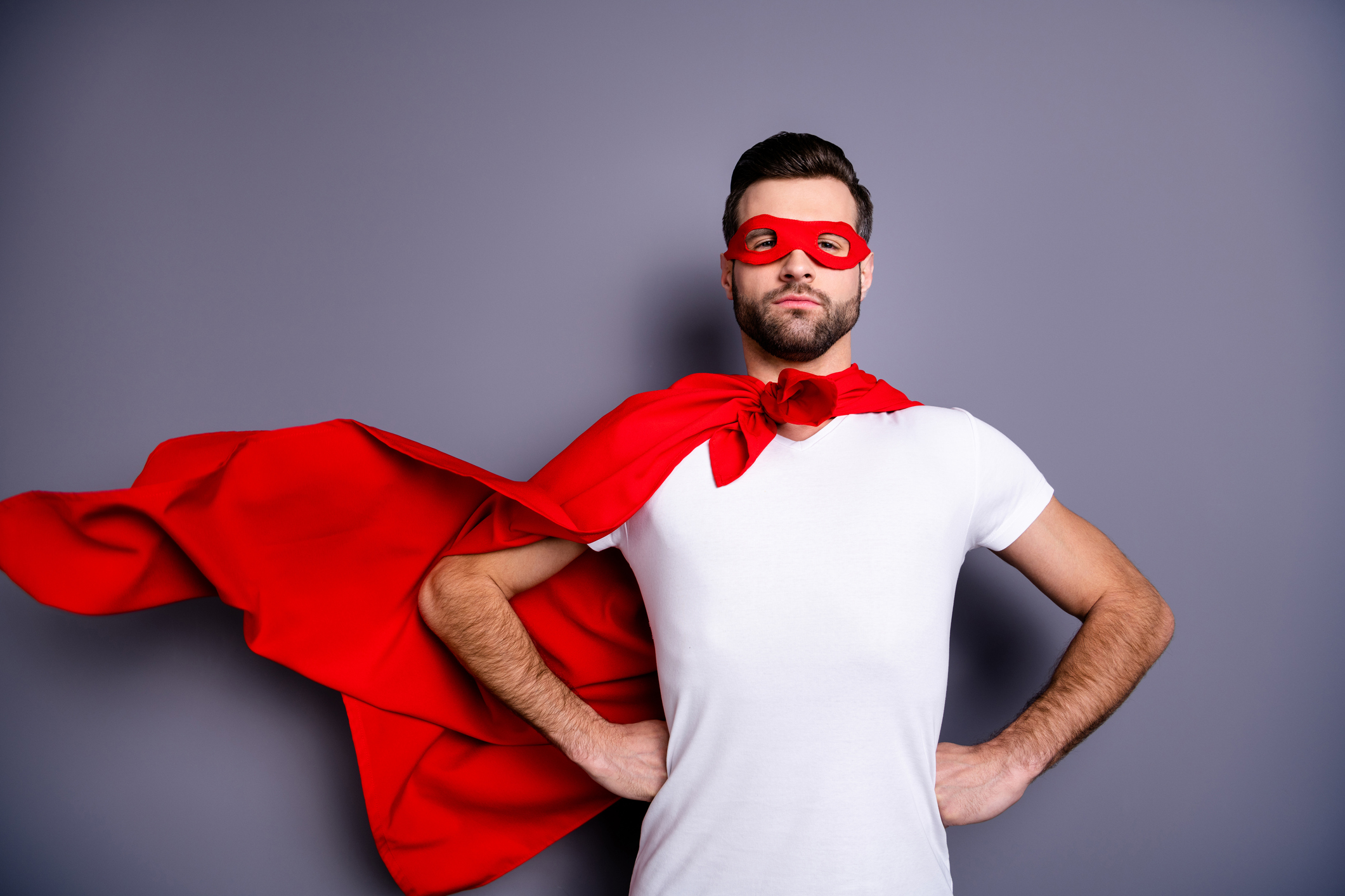 Portrait of his he nice-looking attractive content macho virile candid masculine brutal sportive perfect bearded guy hands on hips ready to rescue isolated over gray pastel background