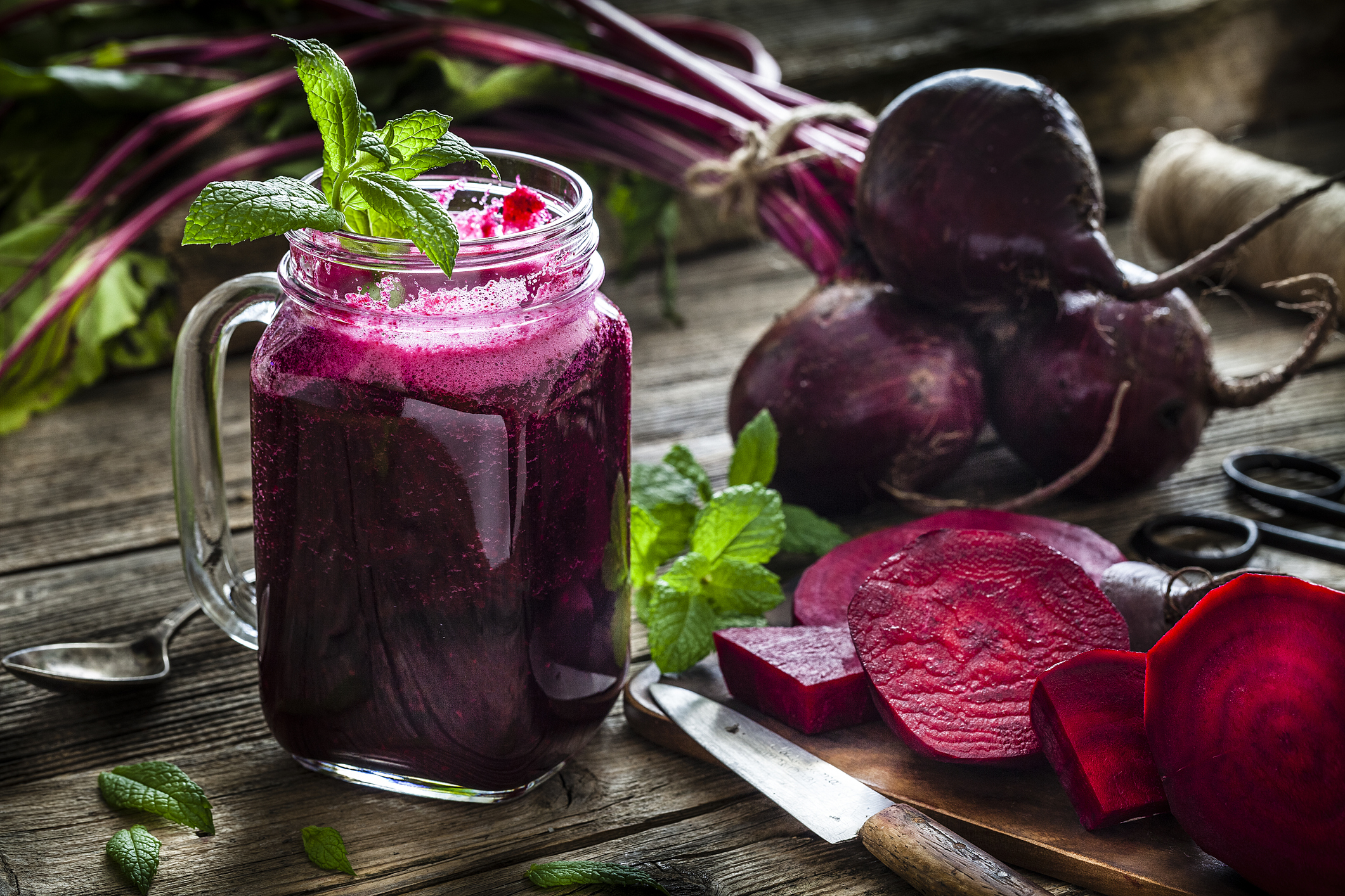 Healthy drink: beet juice on rustic wooden table