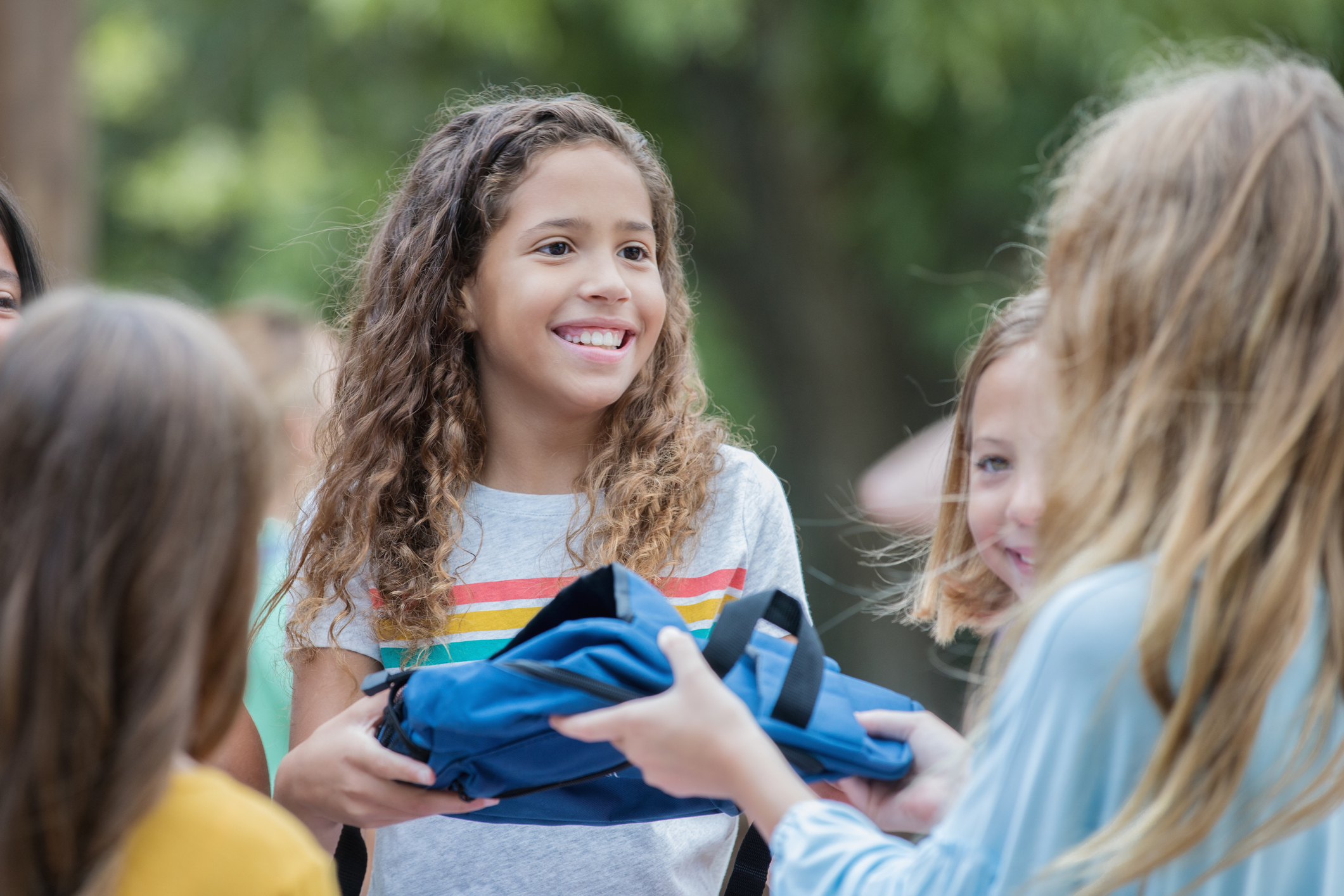 Children volunteering at school supply donation drive at elementary school