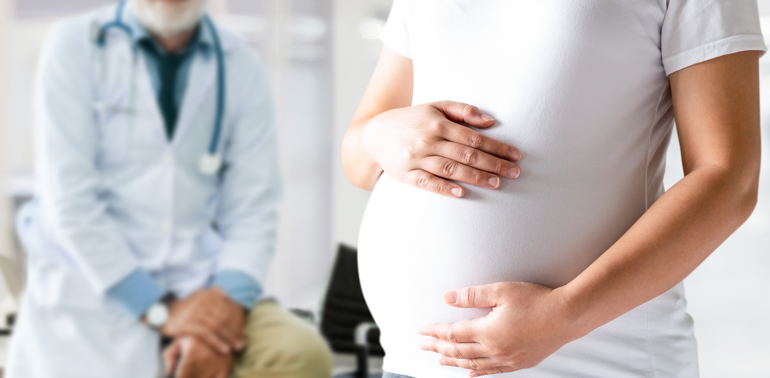 Pregnant Woman and Gynecologist Doctor at Hospital