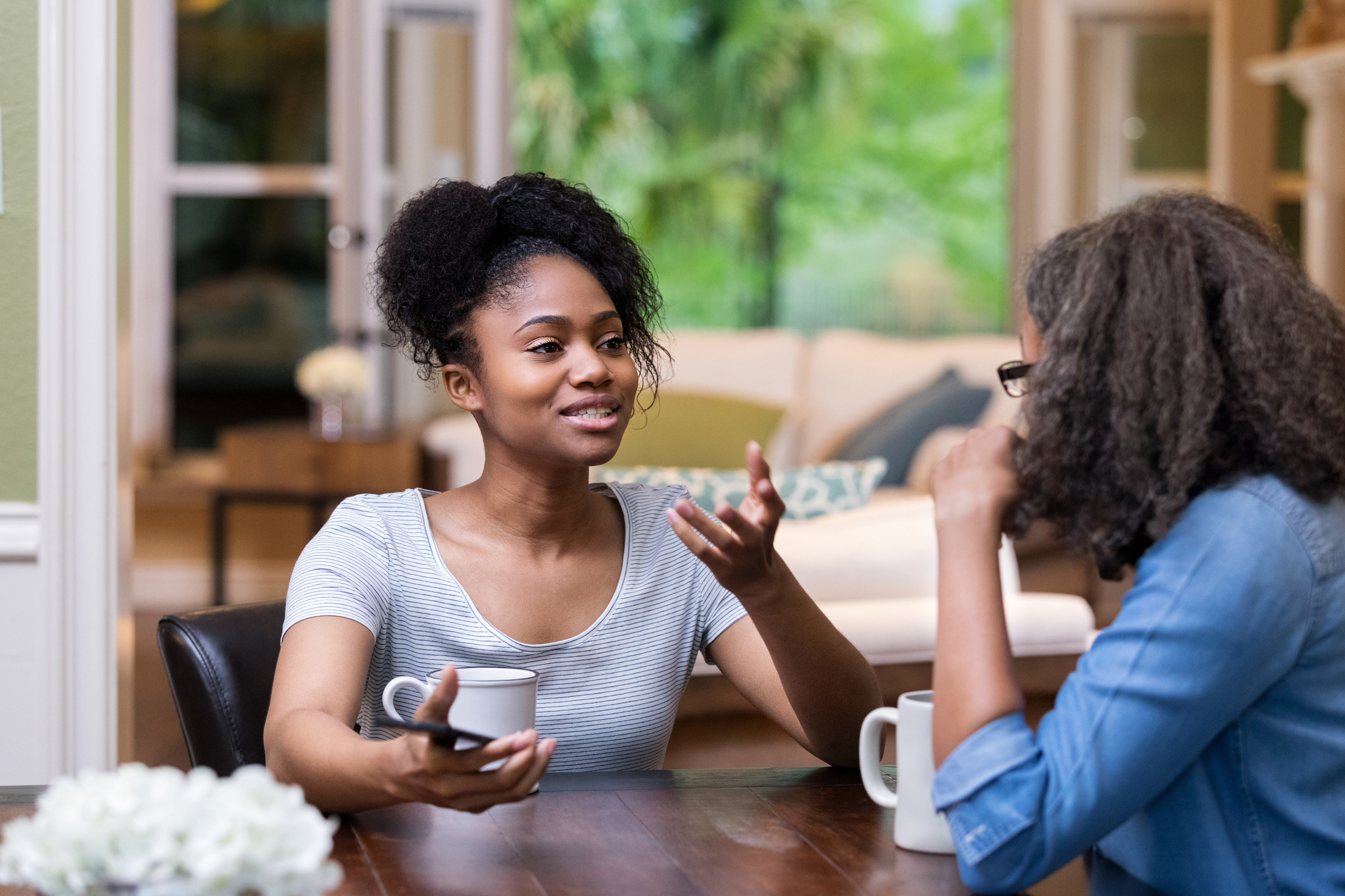 Young woman asks her mom for advice