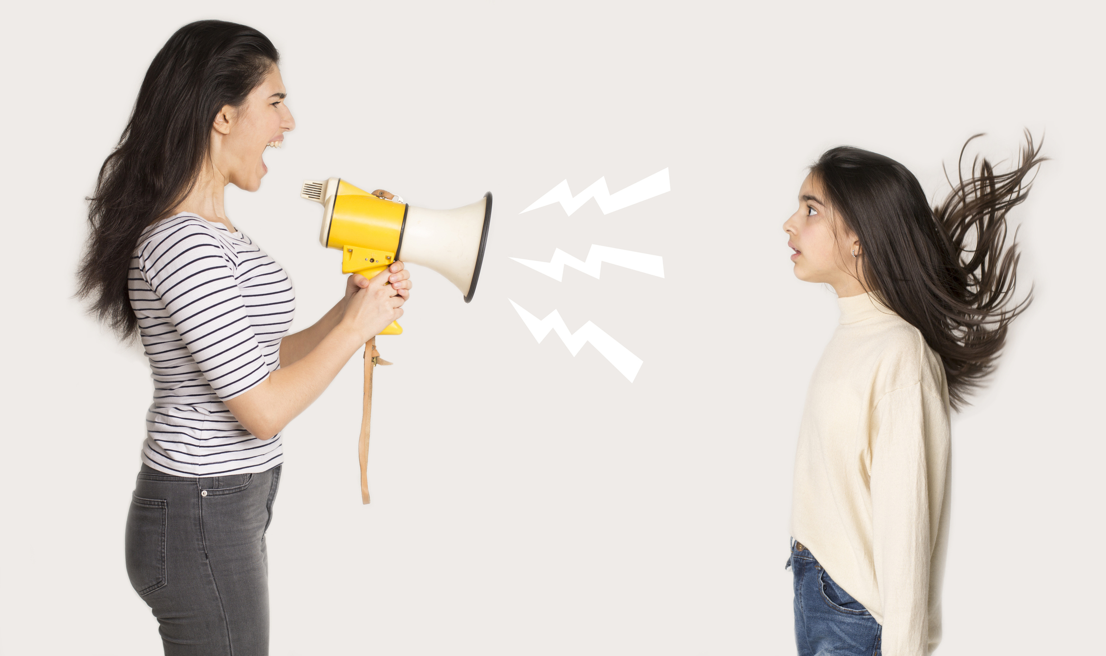 Furious mother shouting at girl through loudspeaker