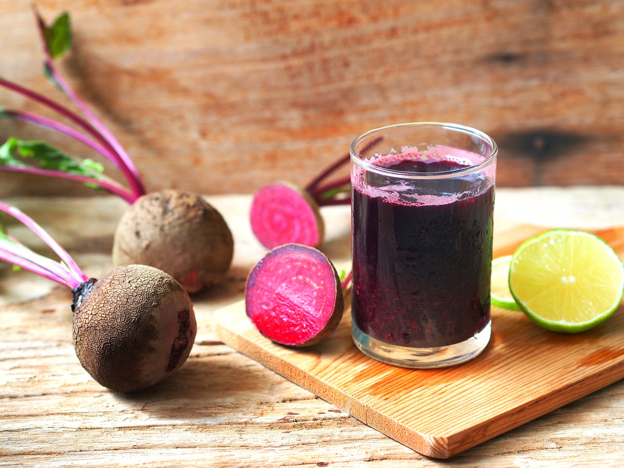 Fresh beetroot and lime juice in glass.