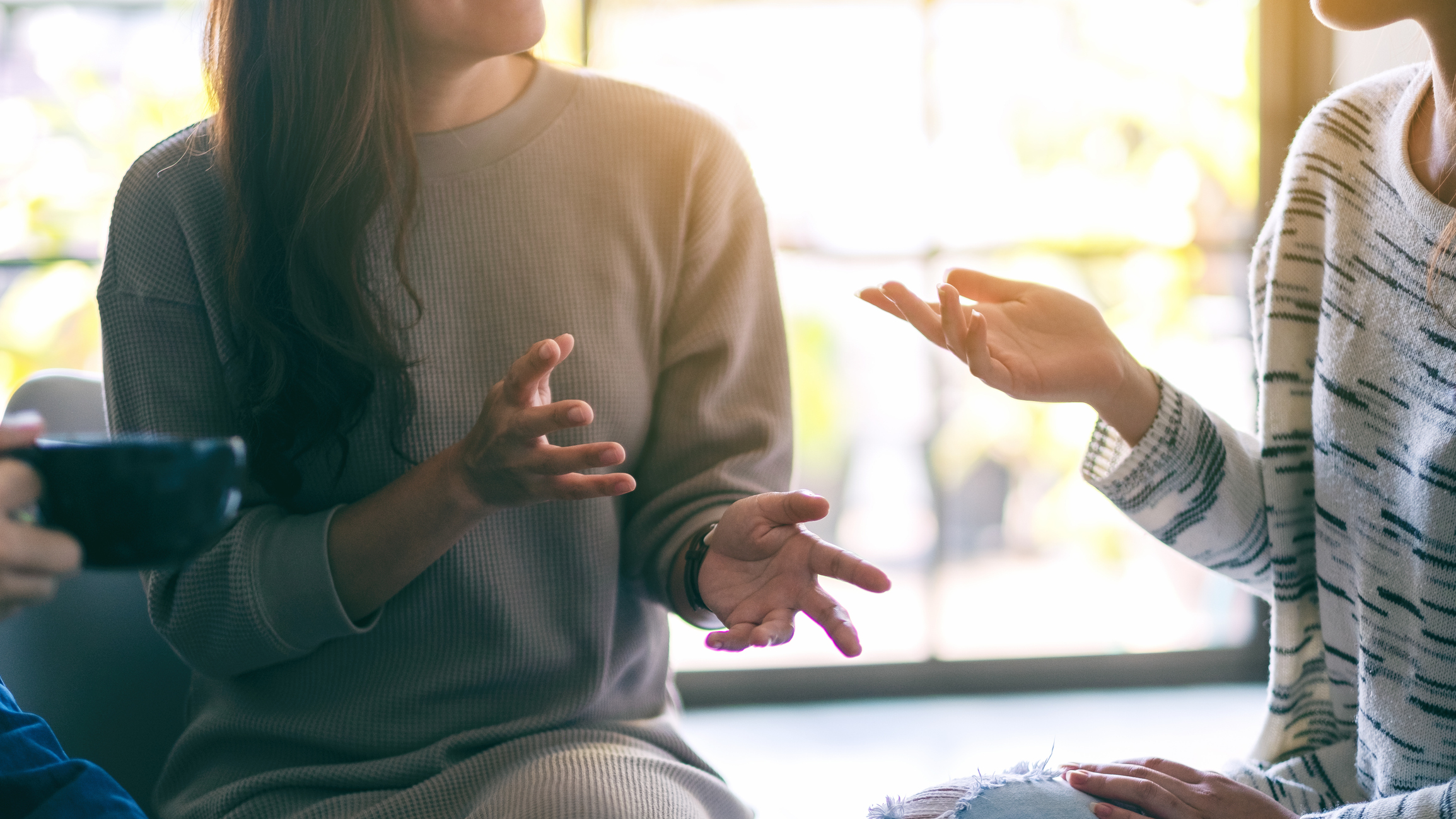 women enjoyed talking and drinking coffee together