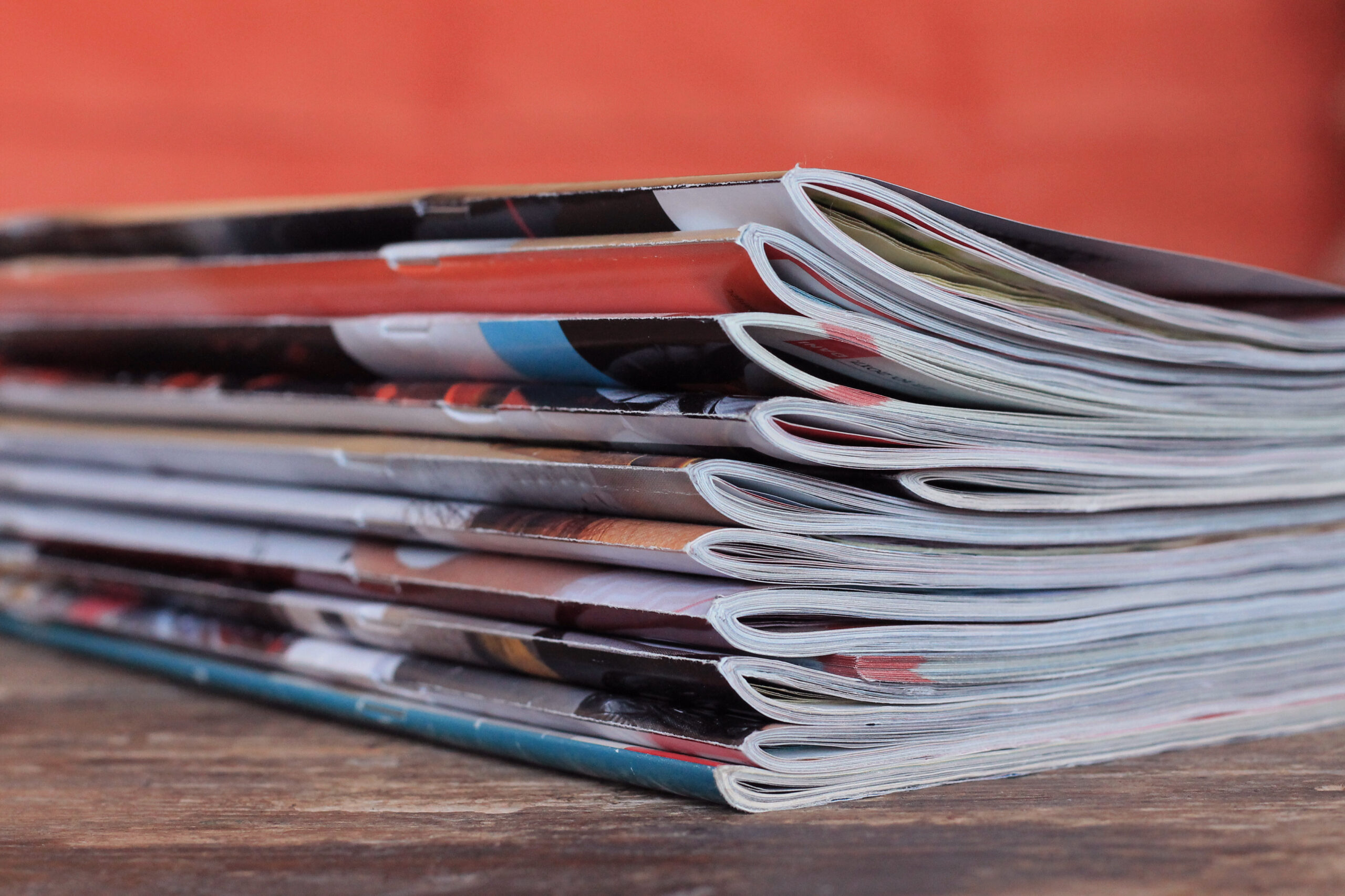 Old magazines on wooden table