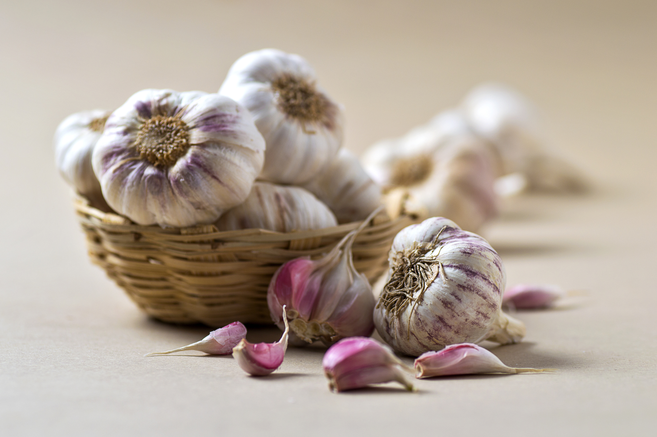 Garlic Cloves and Garlic Bulb in Basket