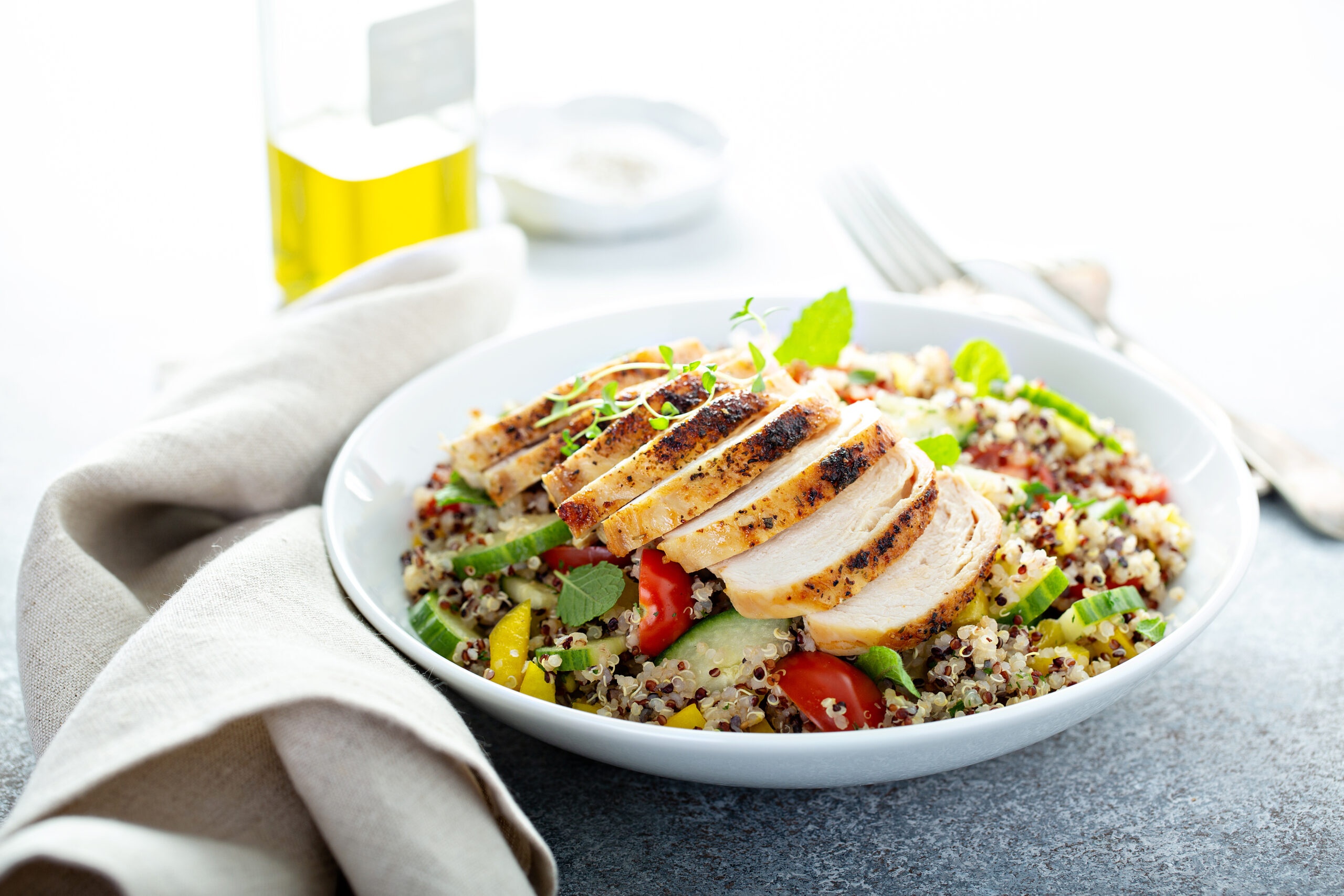 Fresh quinoa tabbouleh salad with grilled chicken