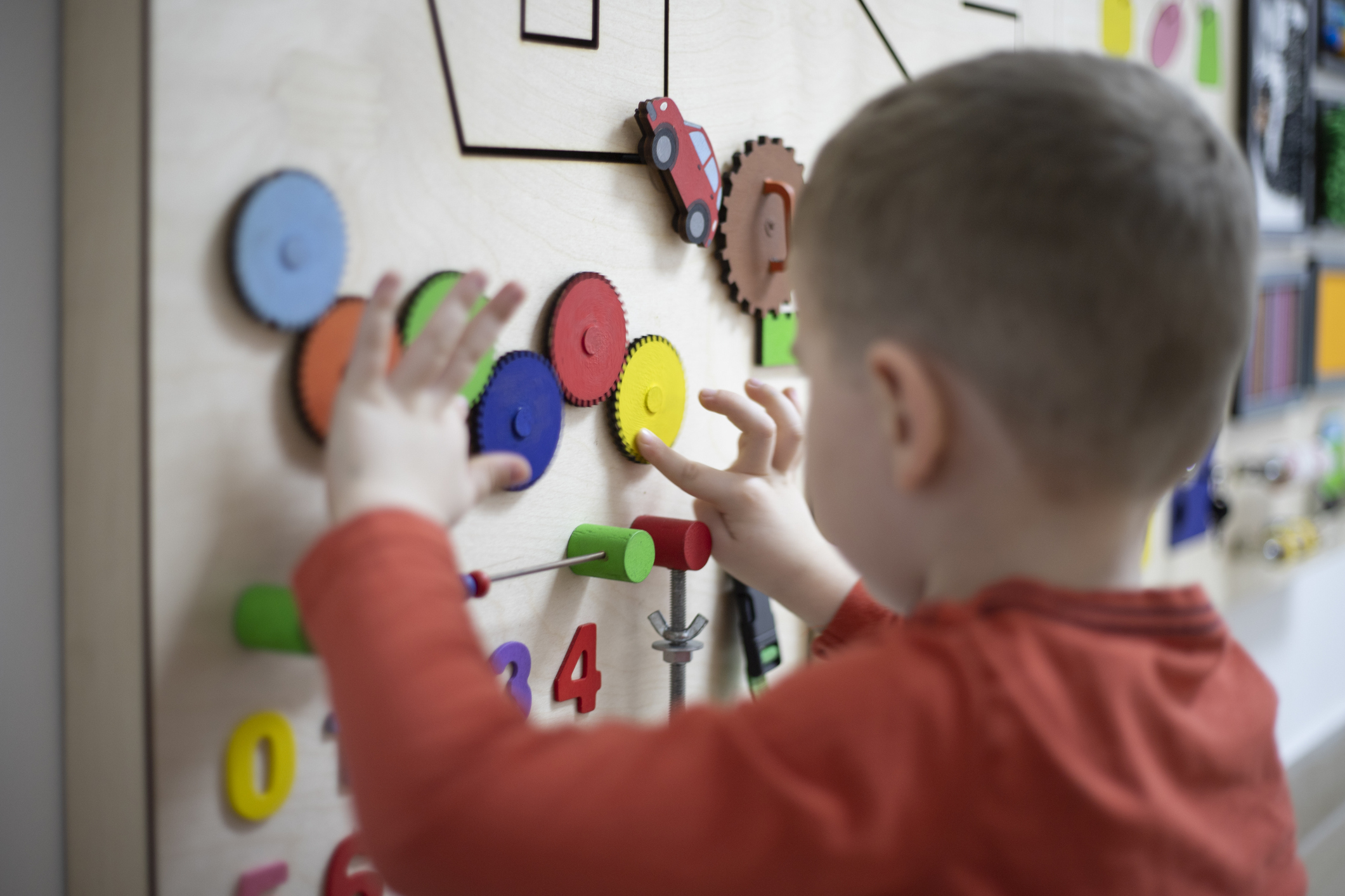 Boy playing with the interactive board