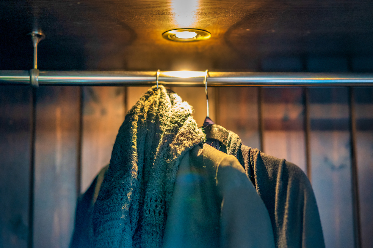 Coats hanging from rail