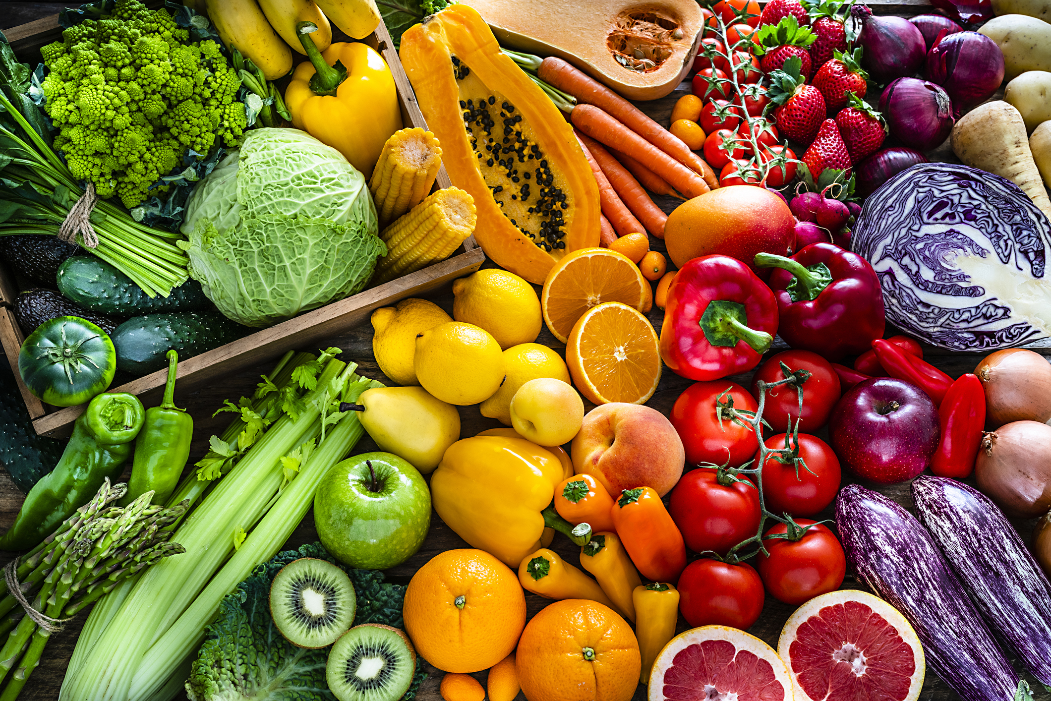 Healthy fresh rainbow colored fruits and vegetables background