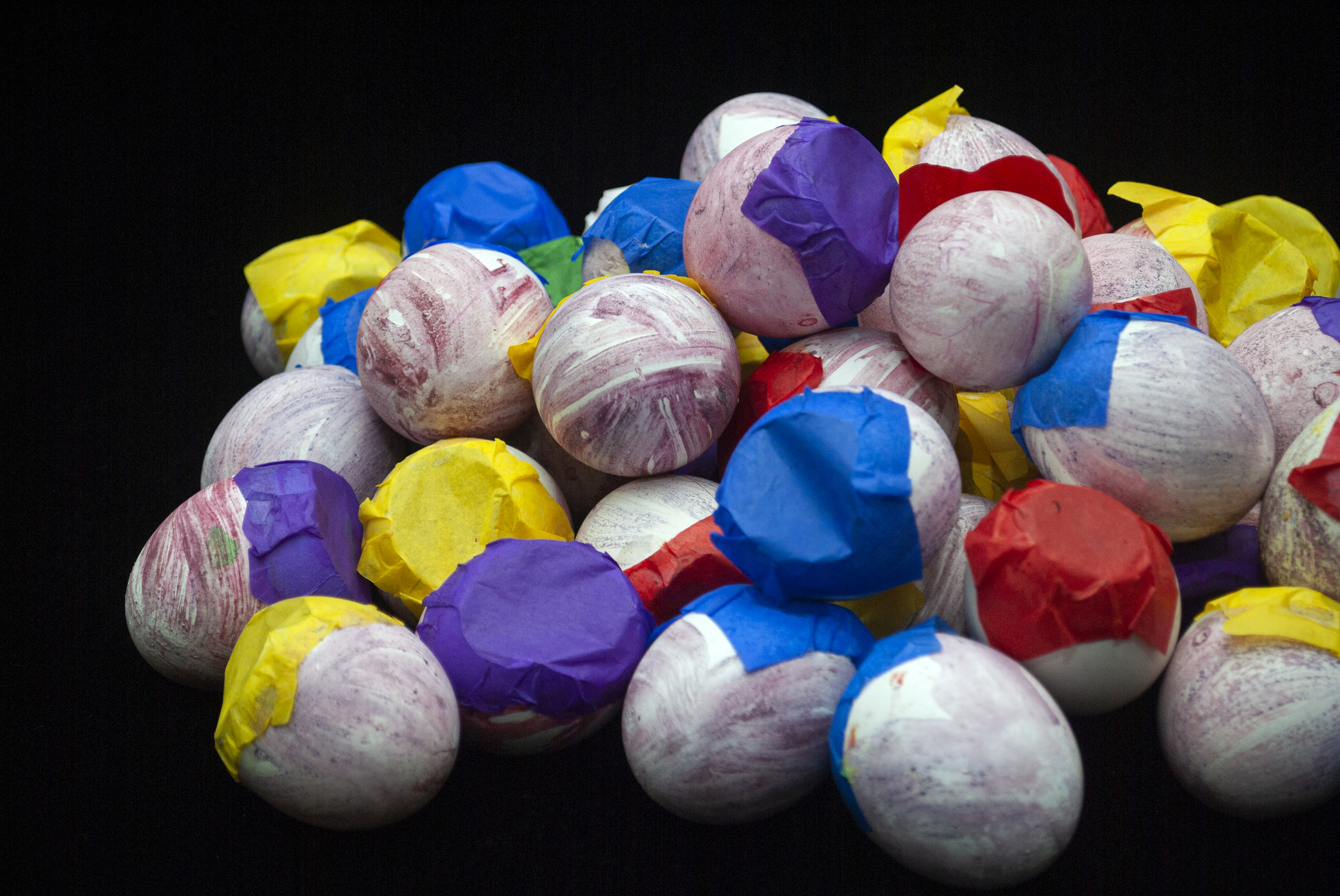 Group of eggshells, painted and decorated by hand, children's carnival celebration, start of Holy Week in Guatemala, Catholic tradition, culture instilled in children.