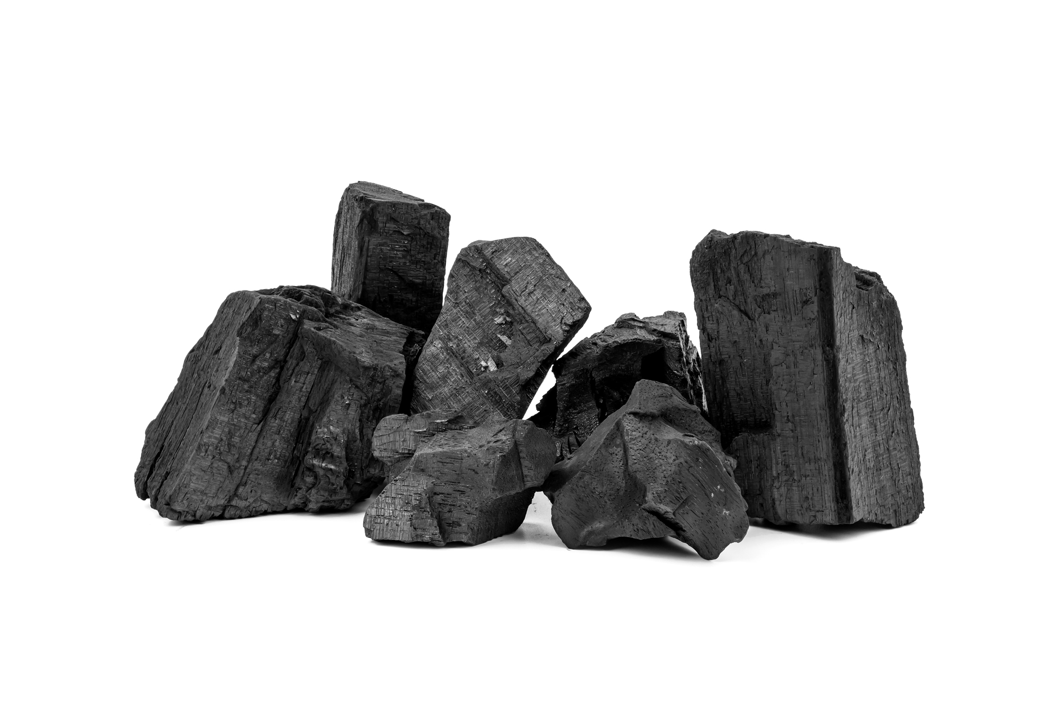 Natural wooden charcoal or traditional hard wood charcoal isolated on white background.