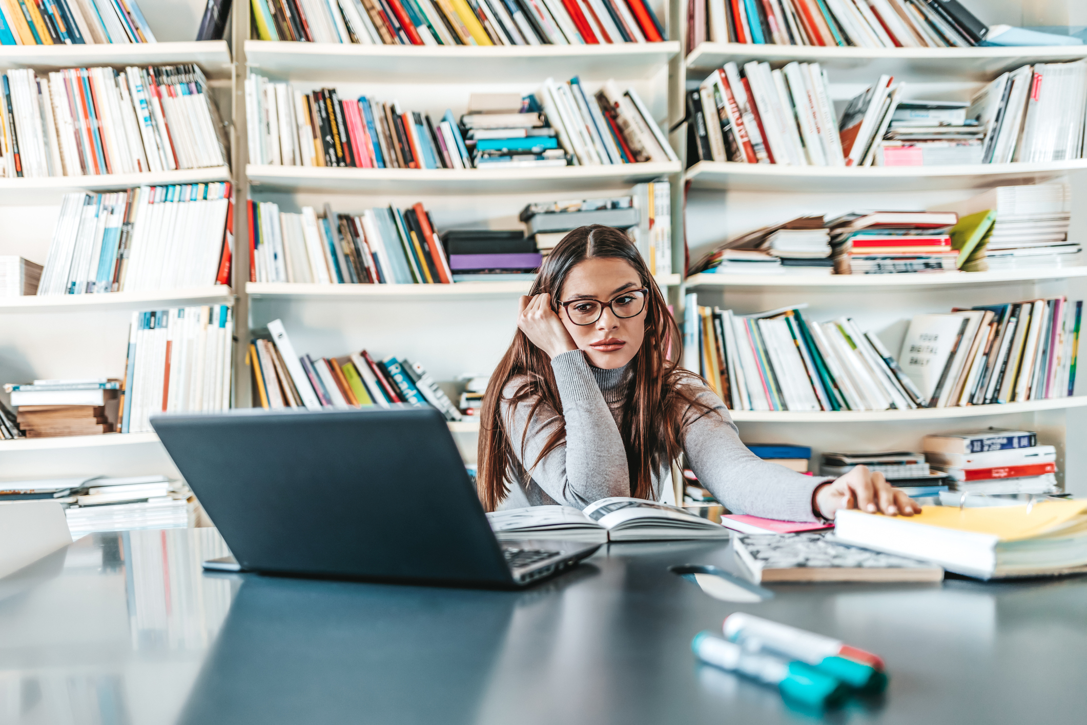 Woman Studying In Library