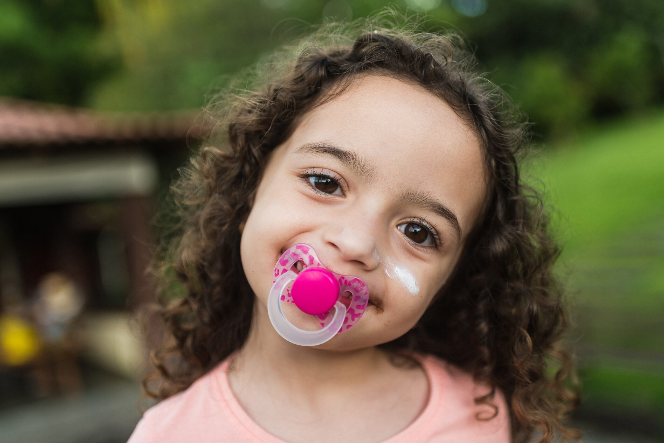 Little girl with pacifier