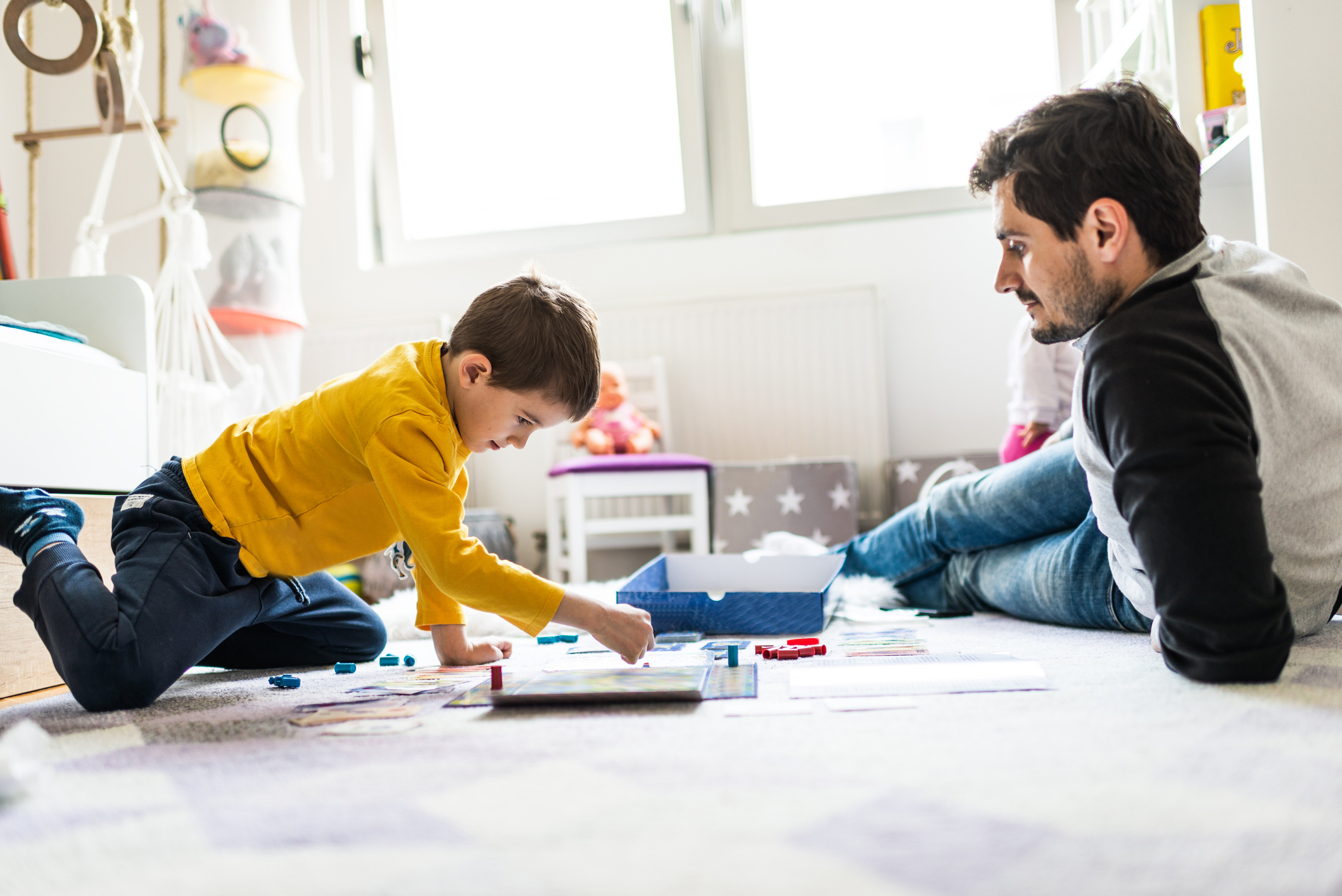 Family playing board game