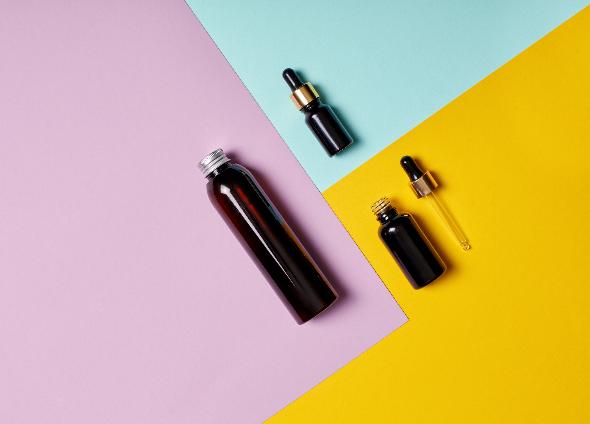 Flat lay of bottles with cosmetics and skin care stuff