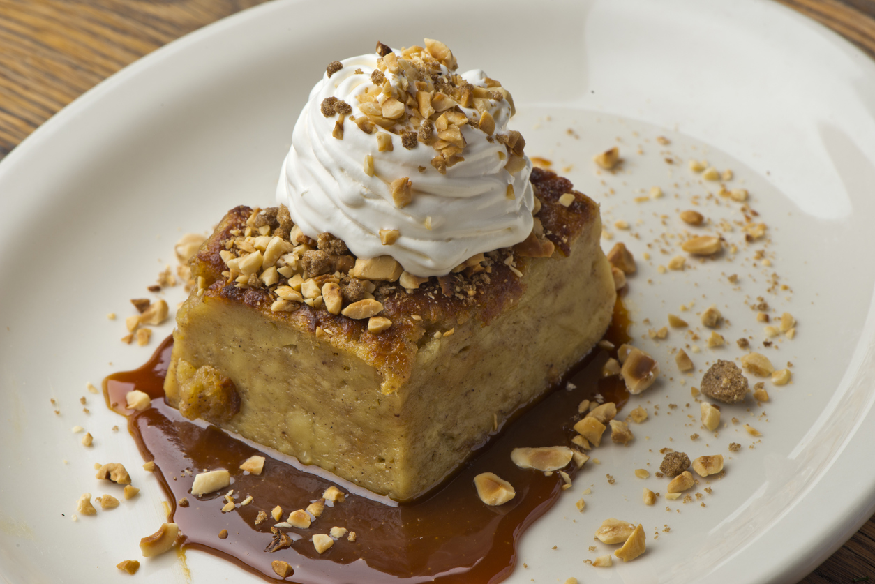 Bread pudding Dessert. Classic American or French bakeries or pastry shop favorites. Cookies, whipped cream, cakes, chocolate syrup butter, eggs and and vanilla beans.