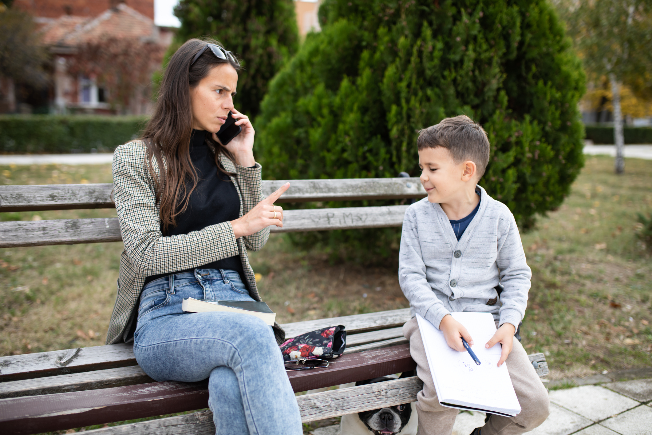 Mom angry at her son for interrupting her phone call