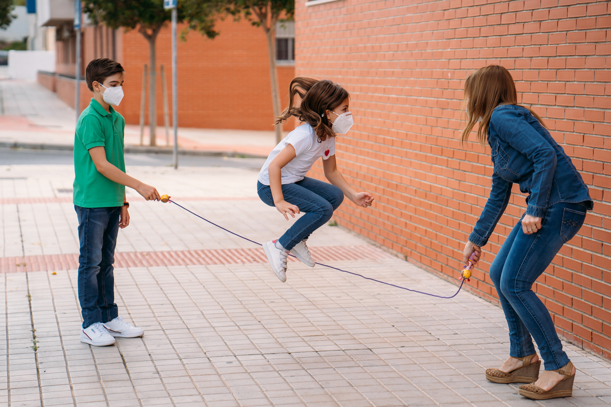 They wear masks to protect themselves from the coronavirus. Social distance