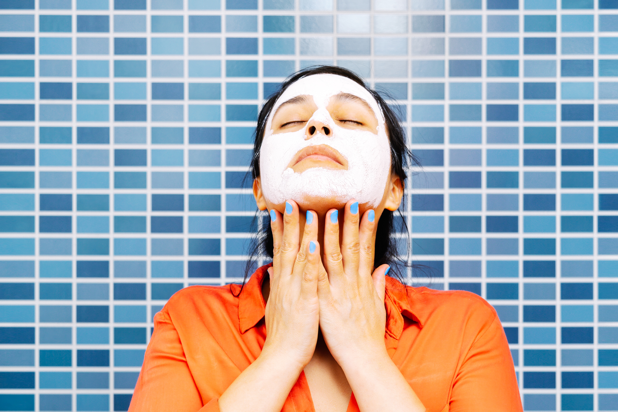 Woman with white beauty mask