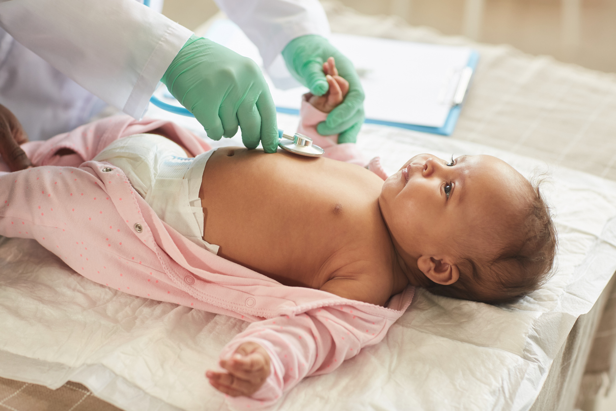 Doctor Examining Baby Close Up