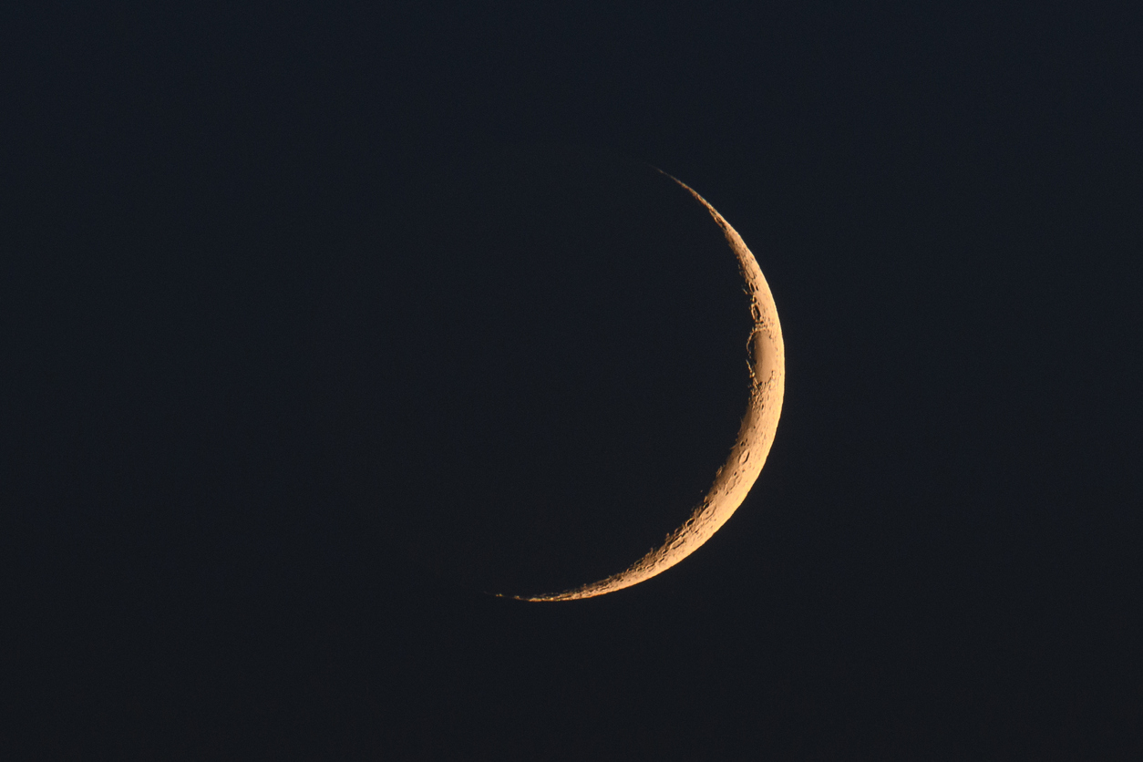 Moon in the night sky just after the New Moon during the waxing phase