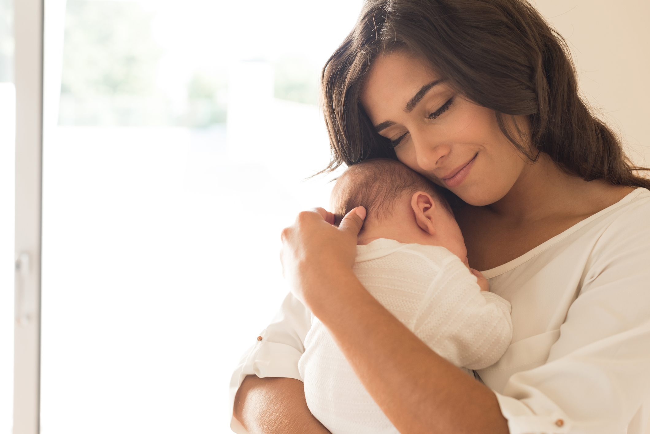 Woman with newborn baby