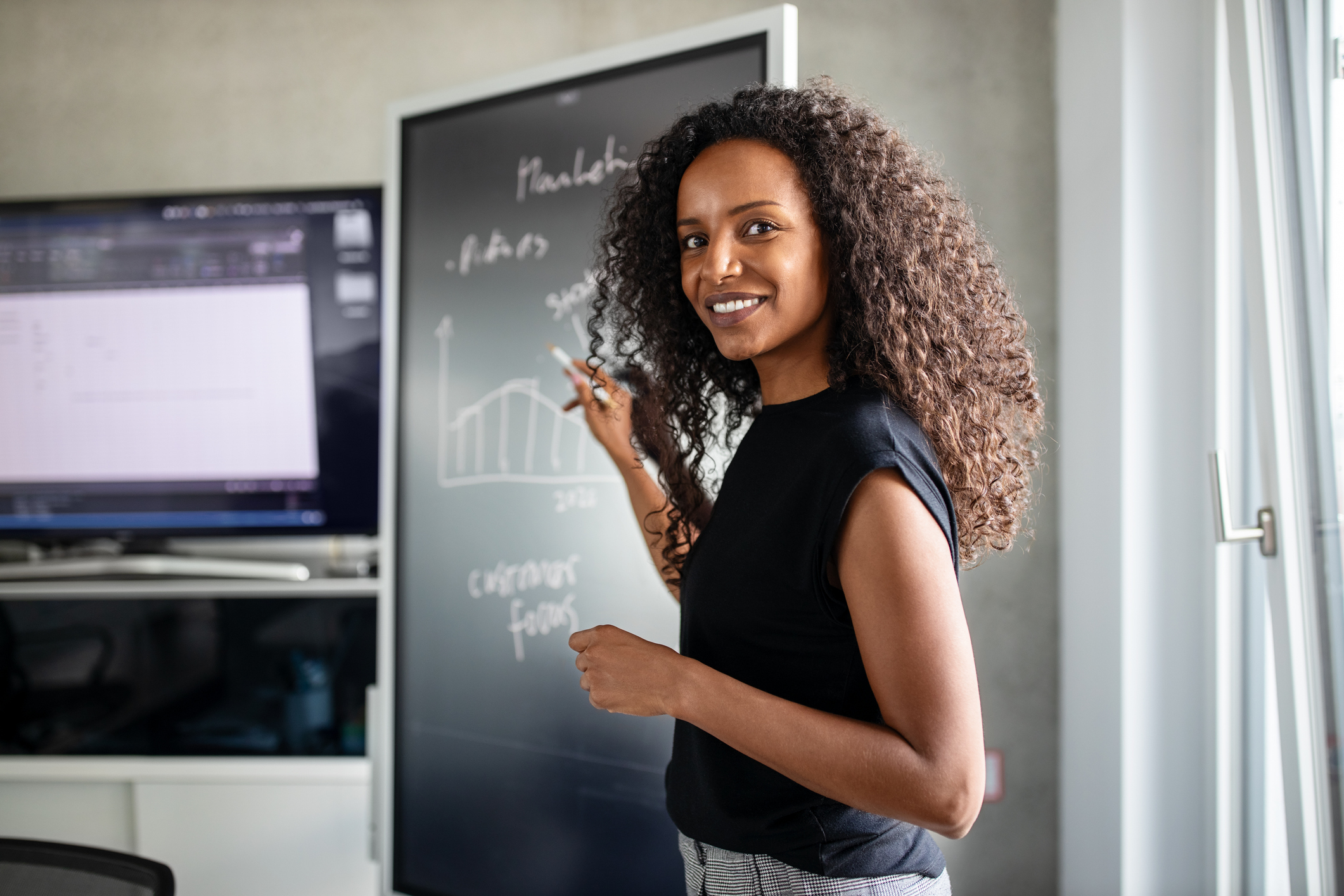 Female professional giving presentation