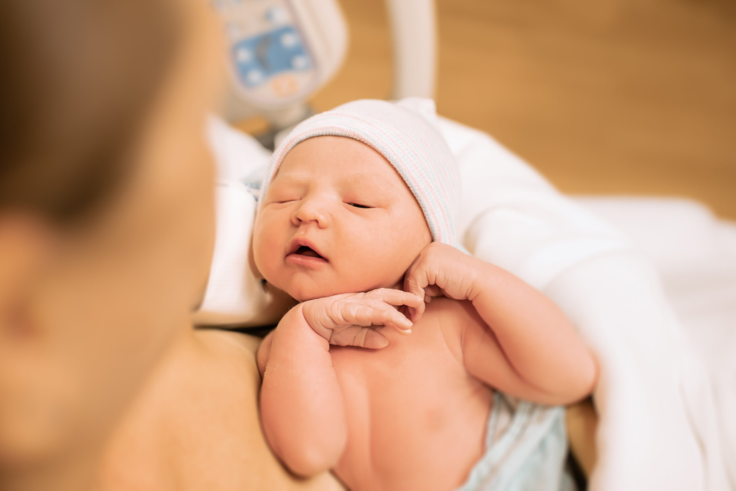 Newborn baby with her mother