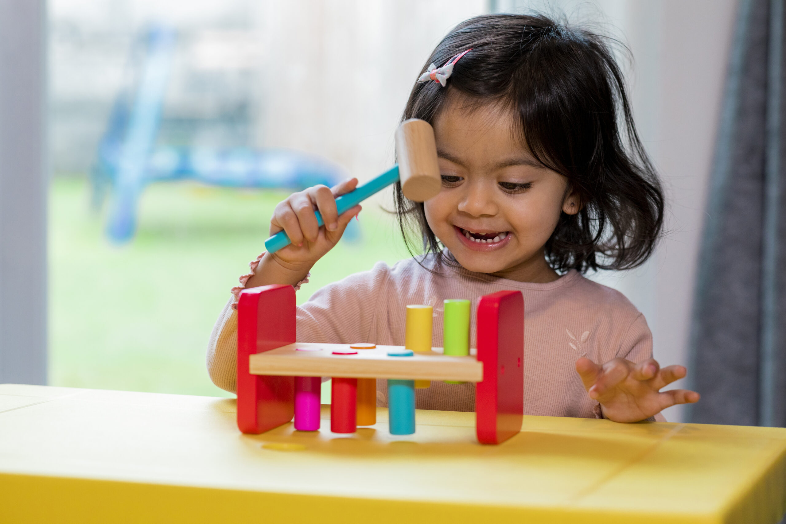 Toddler Playing With an Early Learning Toy