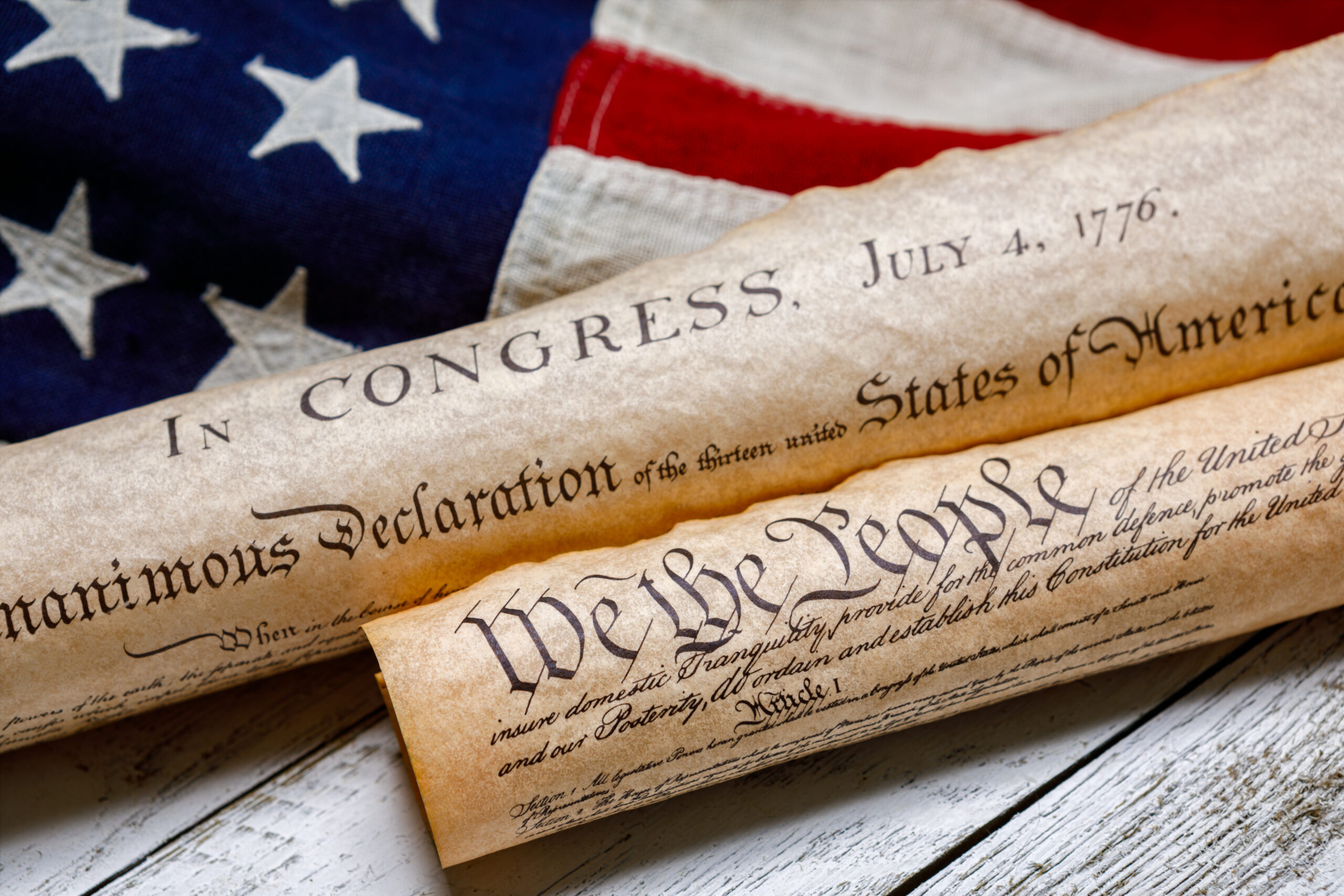 U.S. Constitution and Declaration of Independence on American Flag