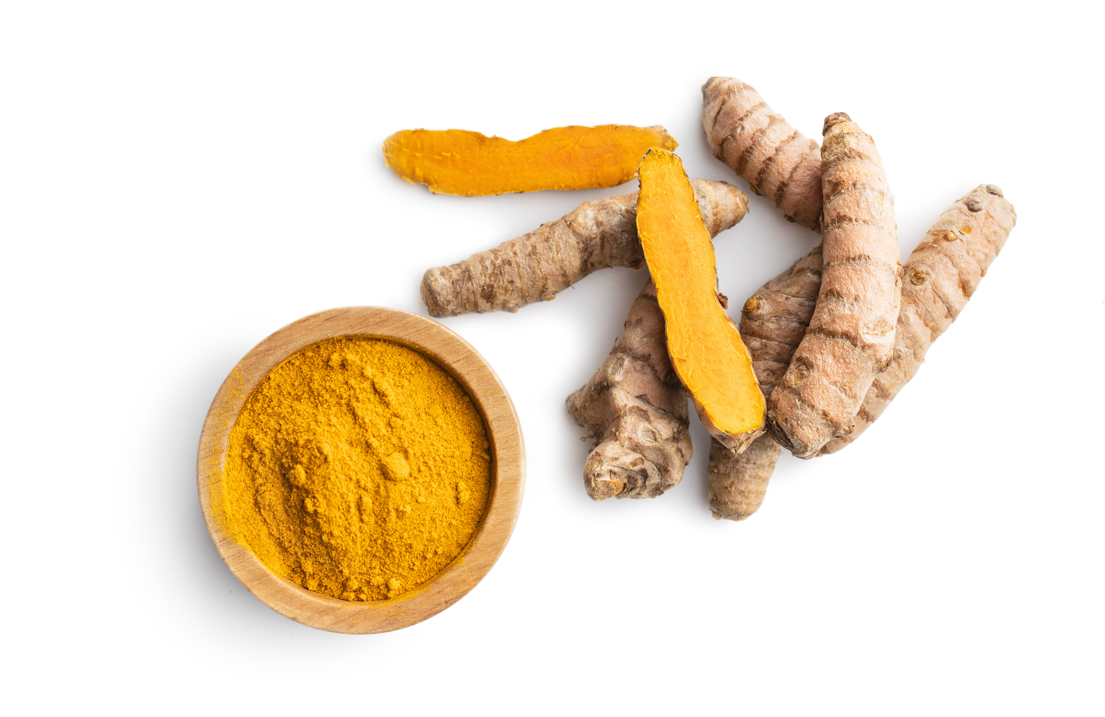 Indian turmeric powder and root. Turmeric spice. Ground turmeric